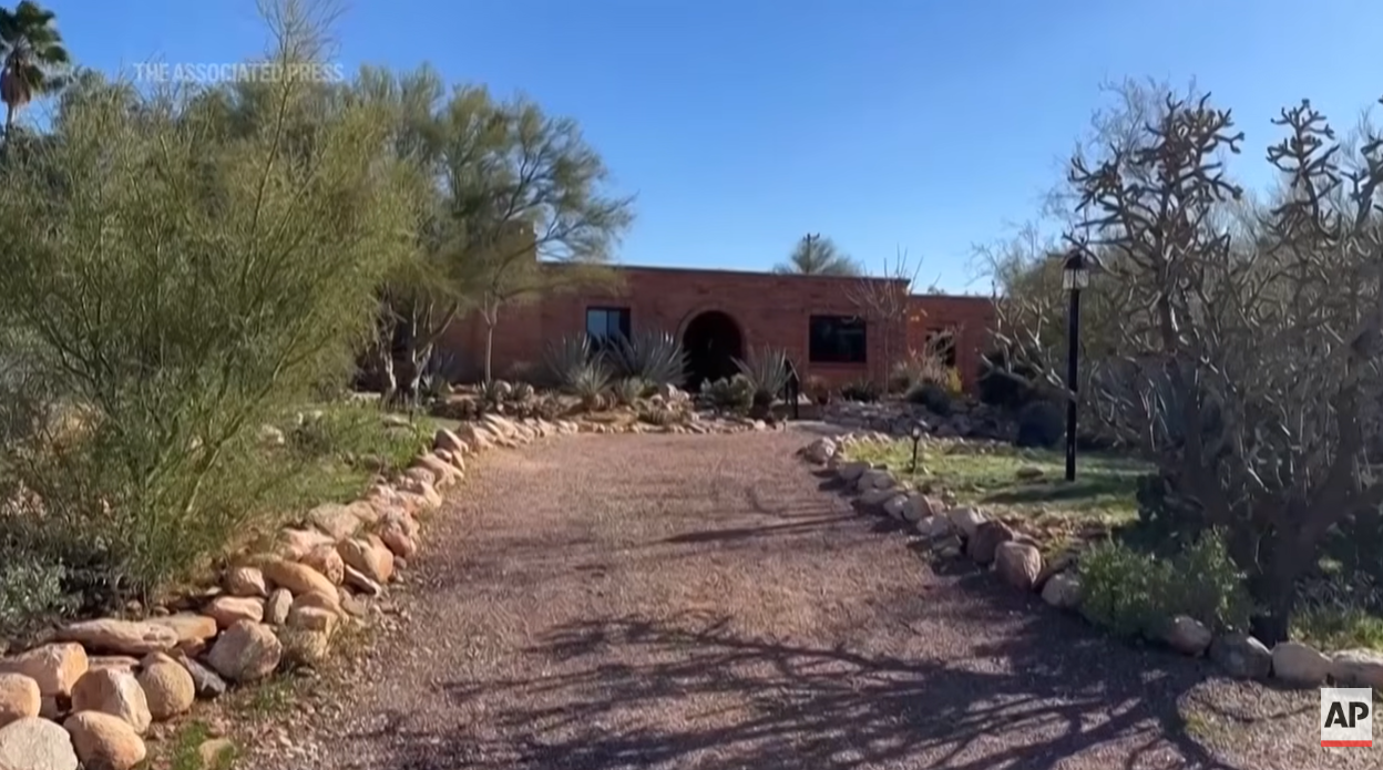 An exterior view of the home of Nancy Guthrie in Catalina, Arizona, as shown in a video posted on February 4, 2025 | Source: YouTube/Associated Press