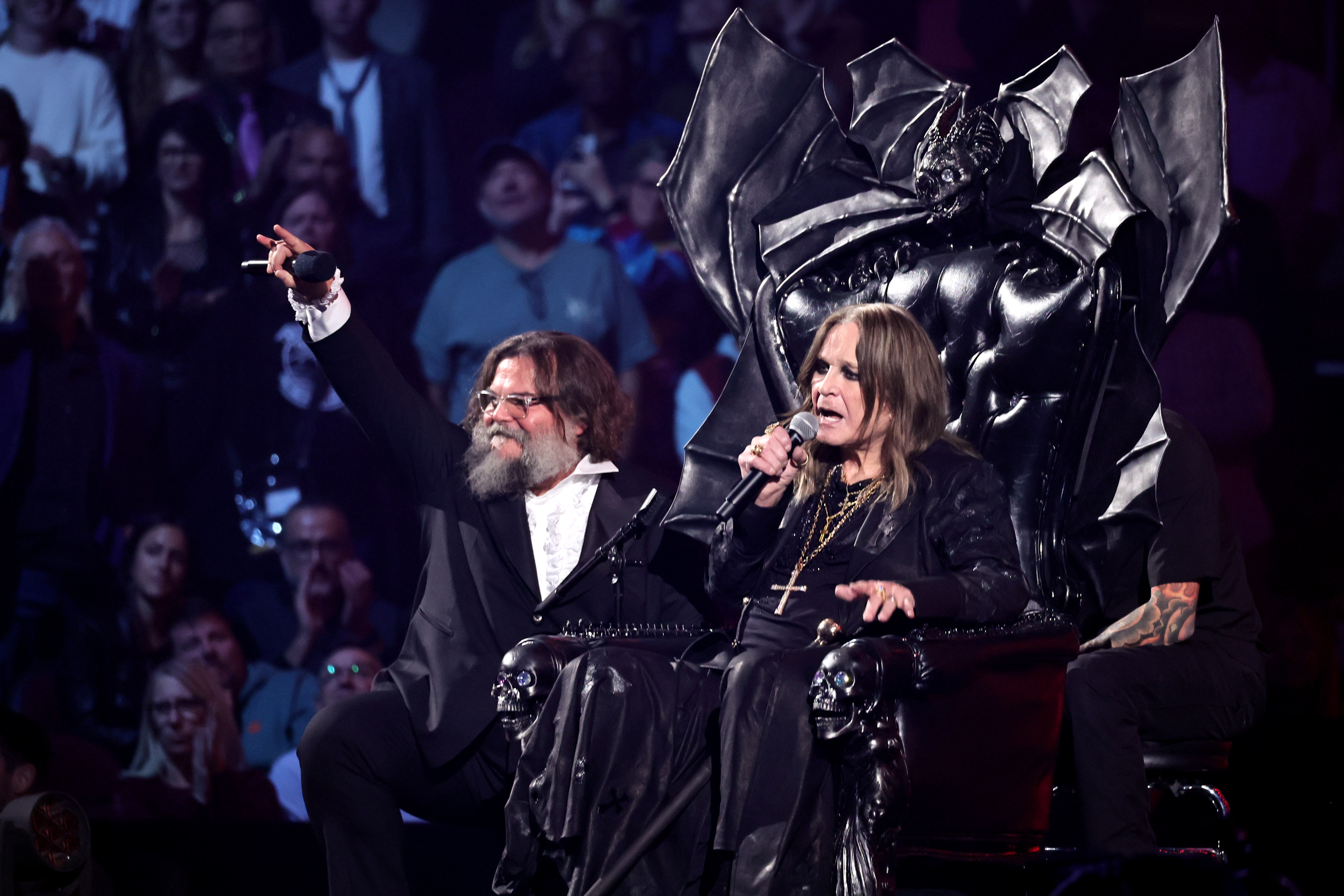 Jack Black and Ozzy Osbourne on stage during the 2024 Rock & Roll Hall Of Fame Induction Ceremony on October 19, 2024 in Cleveland, Ohio. | Source: Getty Images
