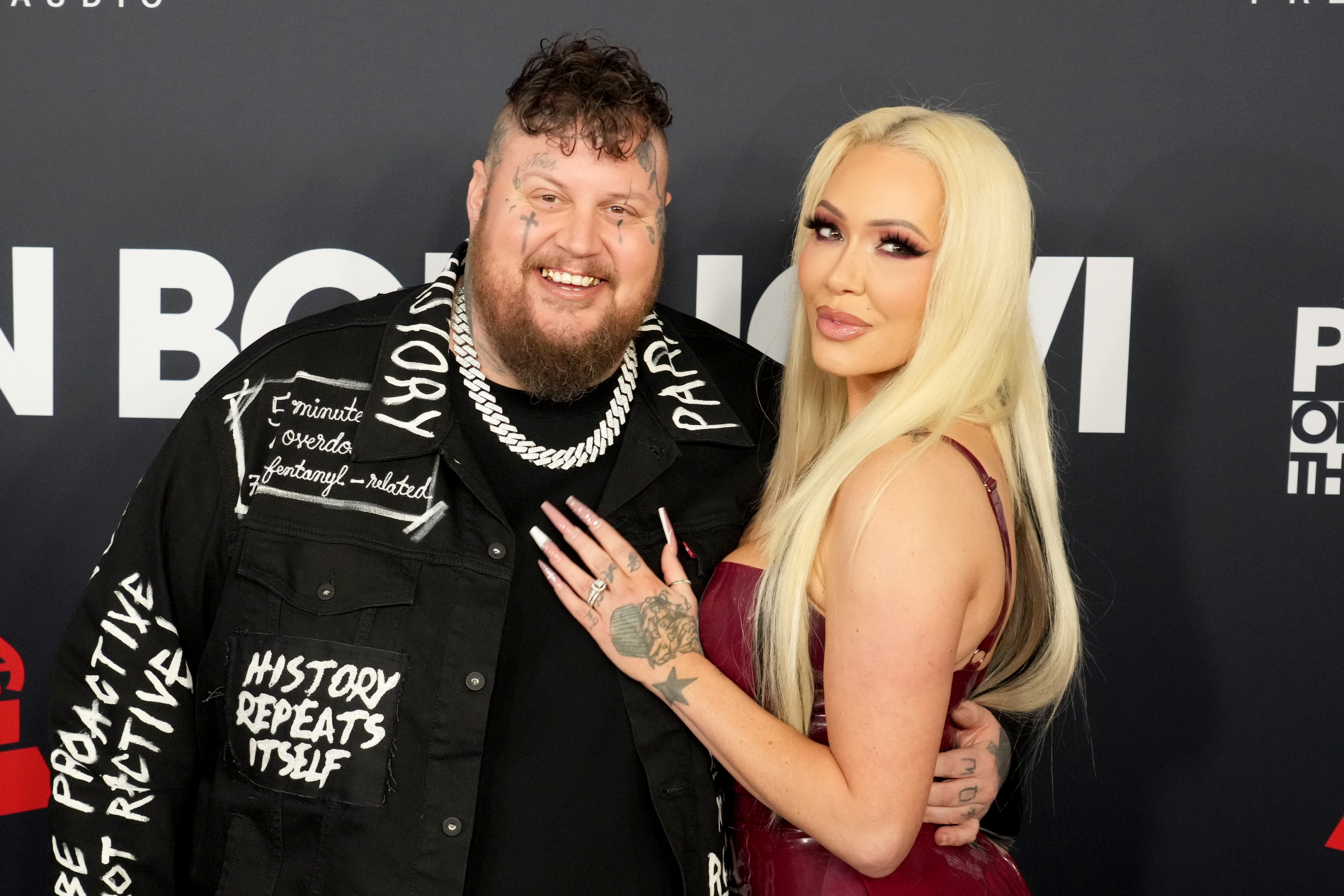 Jelly Roll and Bunnie XO pose together at a public event. In reflecting on the hardships she overcame before finding success, Bunnie said she never allowed herself to dwell on setbacks—a perspective that some fans believe adds another layer of intrigue to her first Instagram post following news of the couple's divorce filing. | Source: Getty Images
