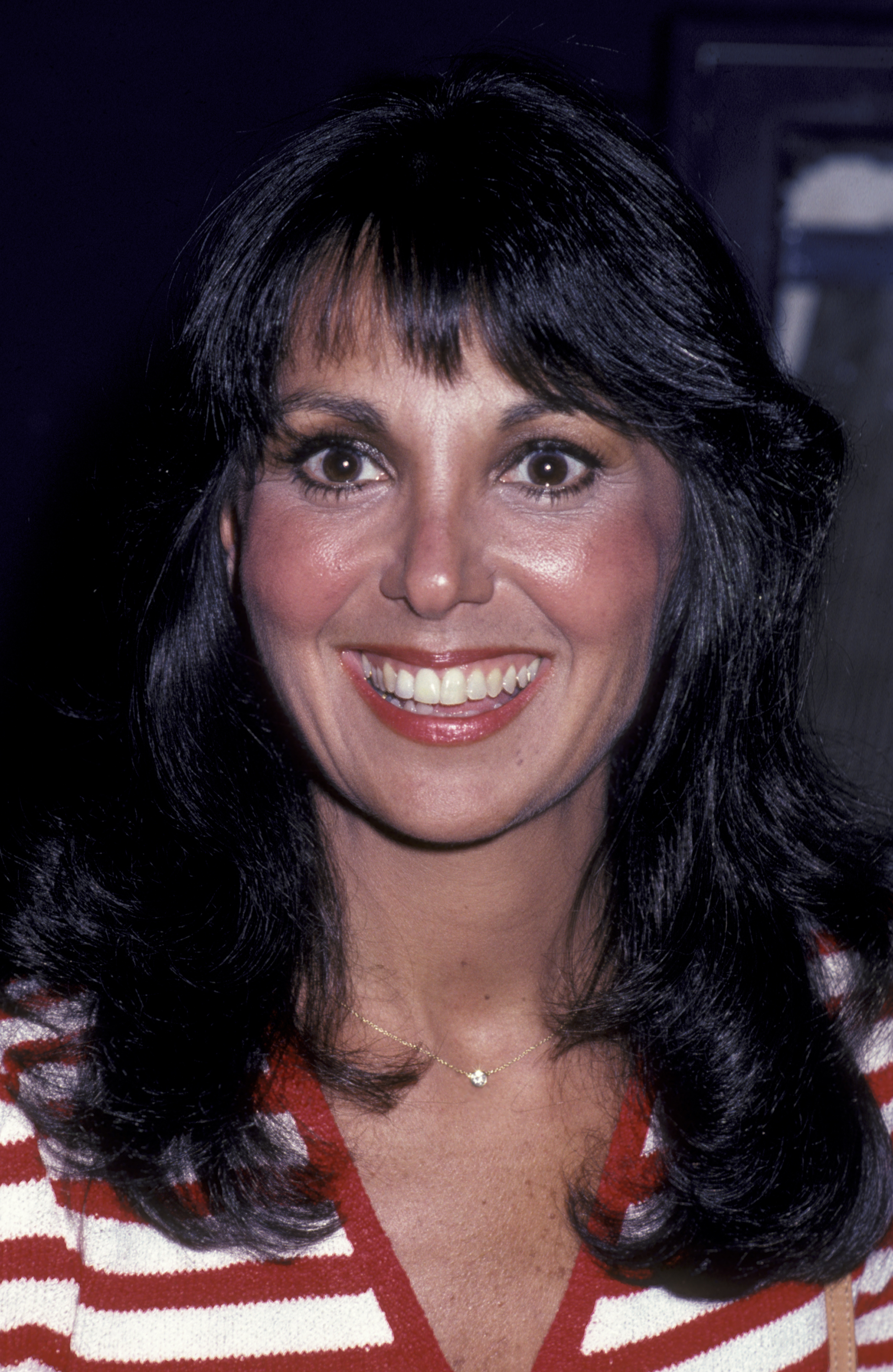 Marlo Thomas smiles for the camera at the Publicists Guild of America Awards, showcasing her signature dark hair and radiant expression. | Source: Getty Images