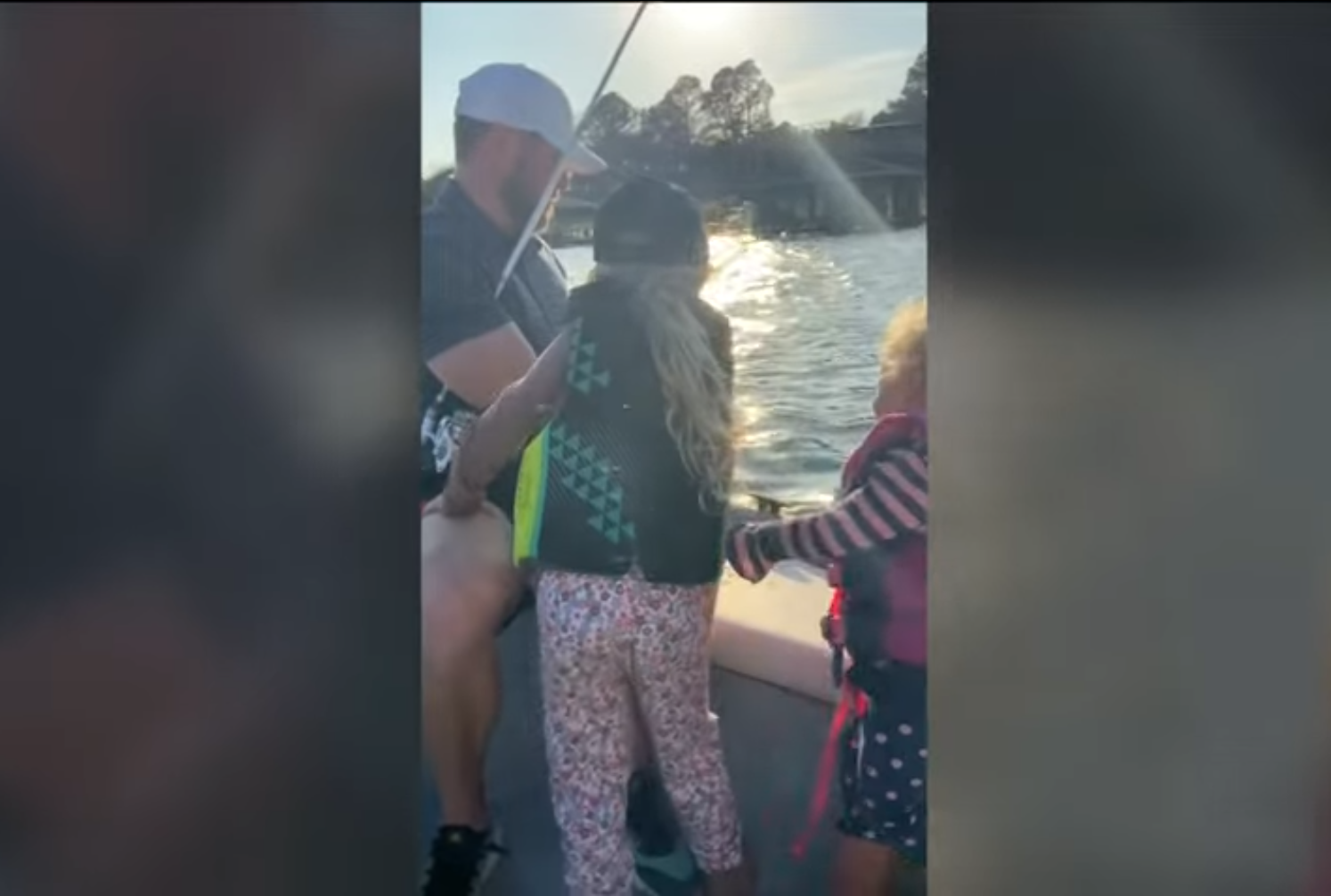 A home video showing Spencer Loalbo fishing with two of his daughters, dated June 20, 2025 | Source: YouTube/kvuenews