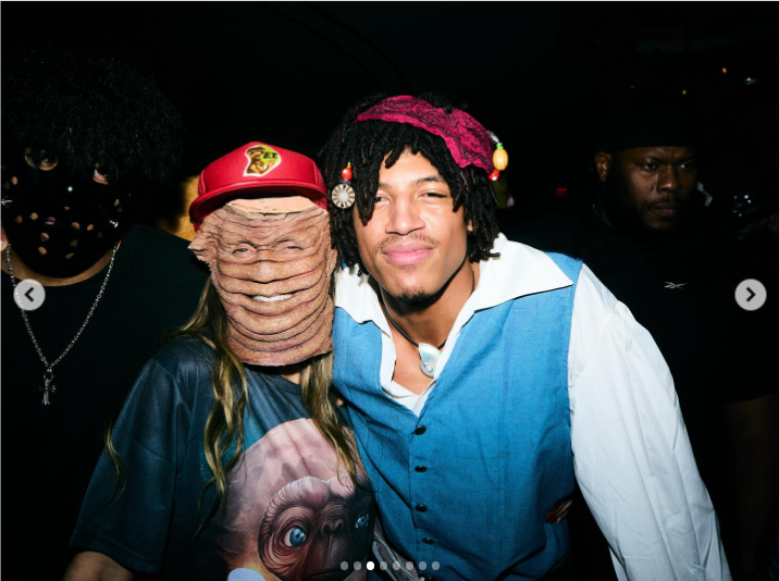 Henry photographed in pirate attire with his mom, Heidi Klum, who sported a layered-face mask and an E.T. shirt. The fun and spooky vibe captured their love for playful, over-the-top costume moments | Source: Instagram/henrygunthersamuel