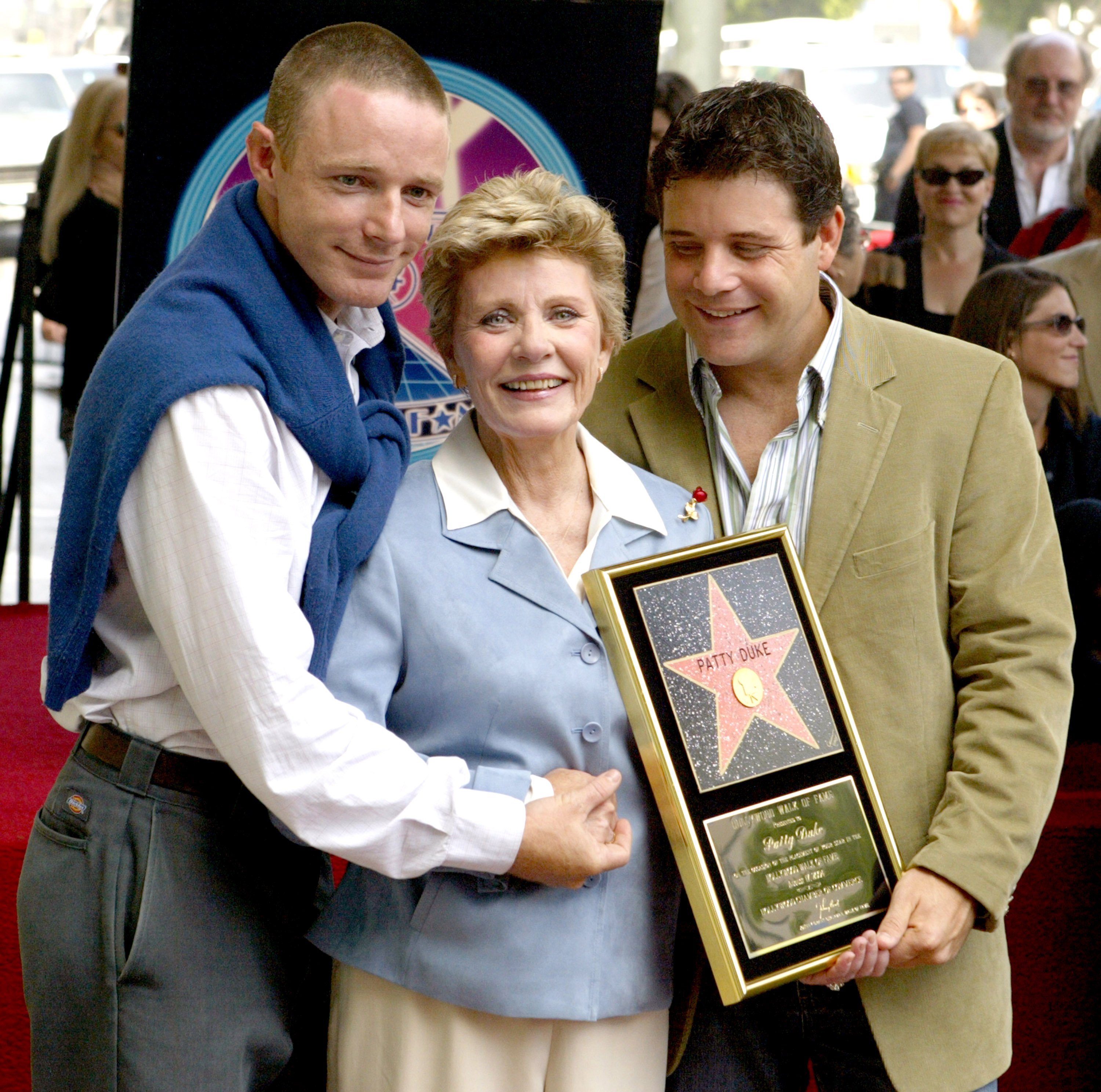 Mackenzie and Sean Astin celebrate with their mother as she receives a Star on the Hollywood Walk of Fame in 2004 | Source: Getty Images