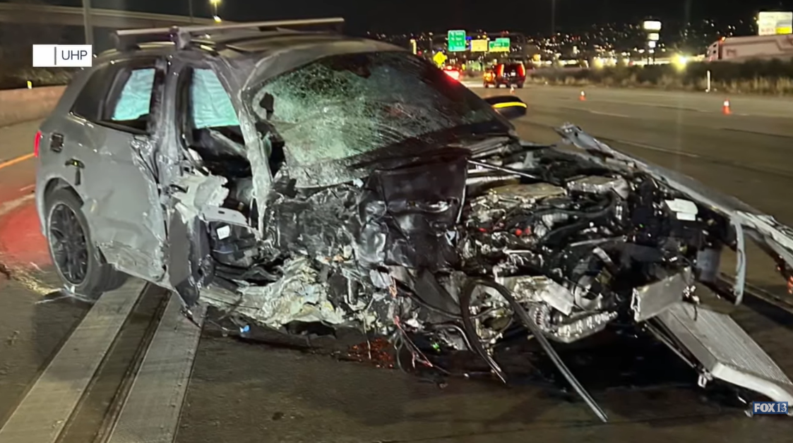 Closer view of the burnt vehicle following the crash on I-15, as posted on November 30, 2025 | Source: YouTube/Fox13now