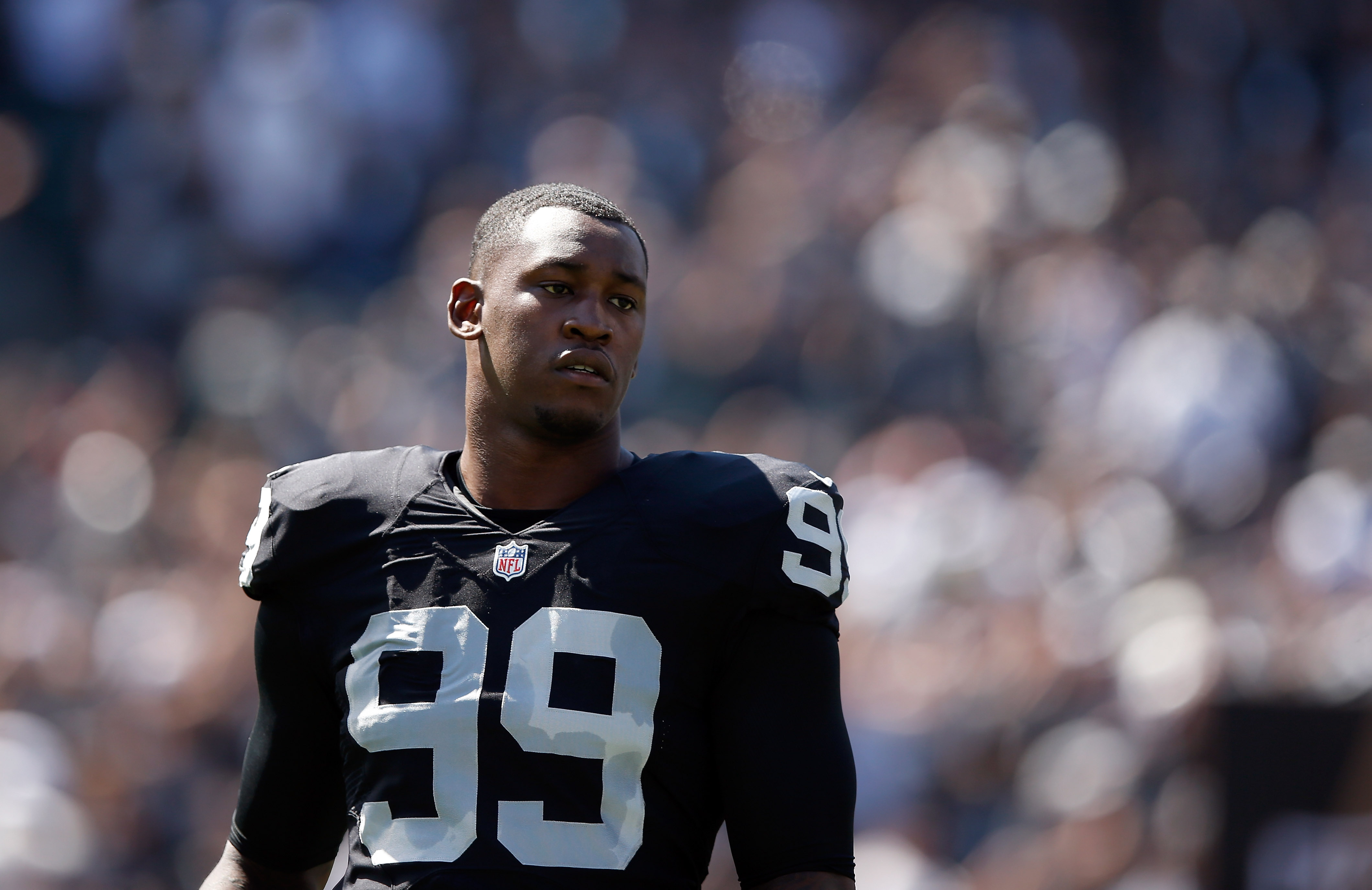 Aldon Smith #99 of the Oakland Raiders is seen on the field before their game against the Baltimore Ravens on September 20, 2015 in Oakland, California | Source: Getty Images