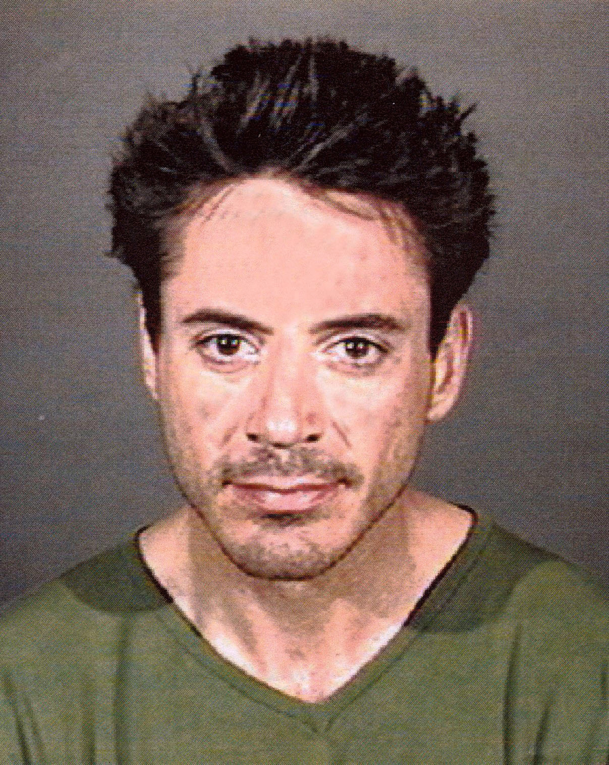 Robert Downey Jr. posing for another mugshot in Culver City, California on April 24, 2001. | Source: Getty Images