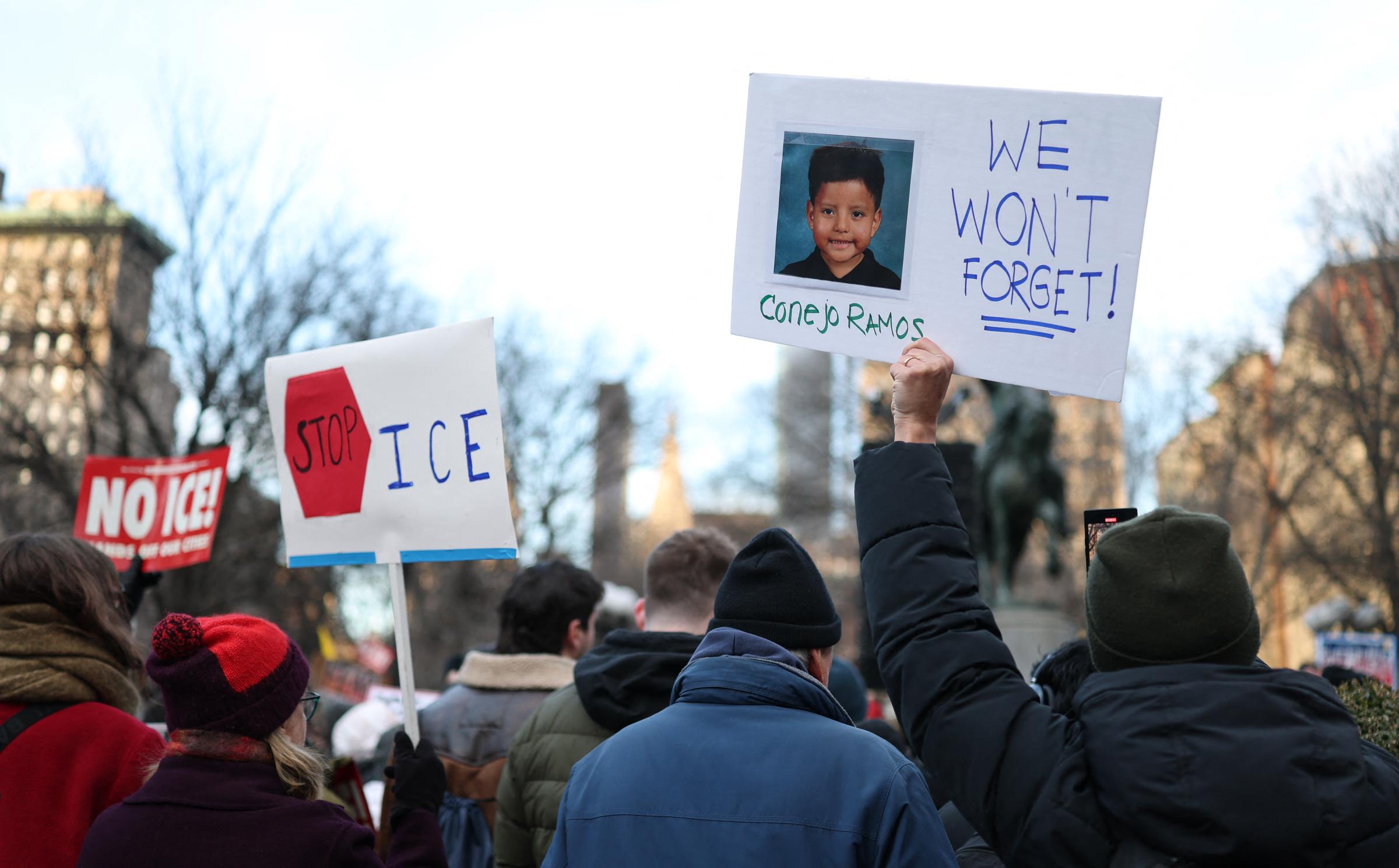 People hold a photo of Liam Conejo Ramos during an "ICE Out" protest in New York on January 23, 2026 | Source: Getty Images