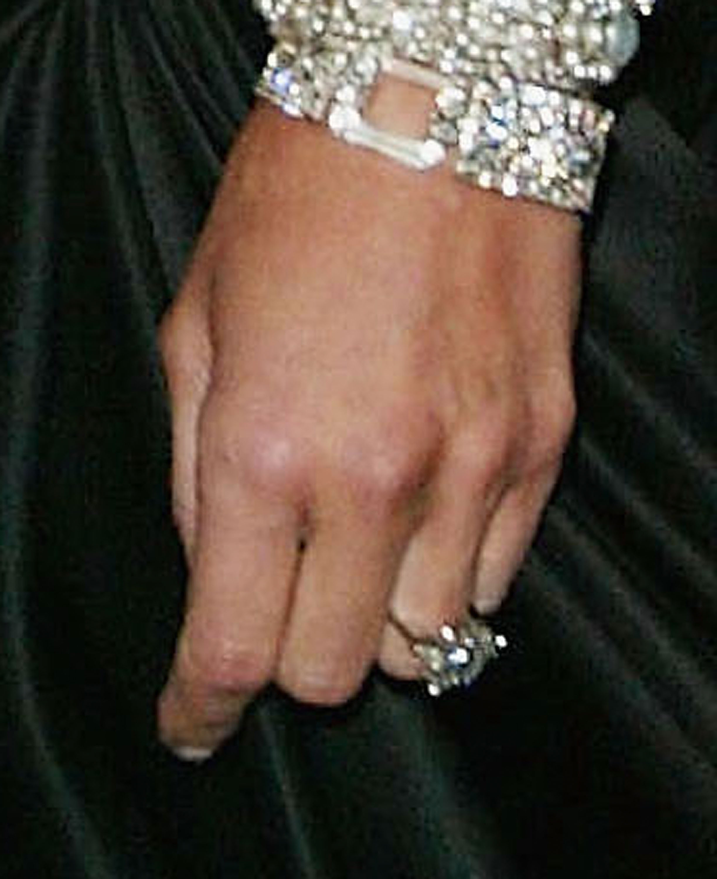 A closeup view is seen of the engagement ring that Donald Trump gave to his then-girlfriend Melania Knauss at the Metropolitan Museum of Art, in New York City on April 26, 2004 | Source: Getty Images