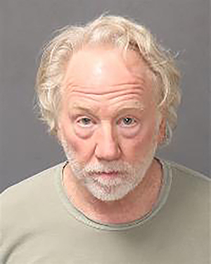 Busfield surrendered to Albuquerque authorities after an arrest warrant was issued in connection with allegations involving two child actors. His booking photograph was taken on January 13, 2026, and released by the Albuquerque Police Department. | Source: Getty Images