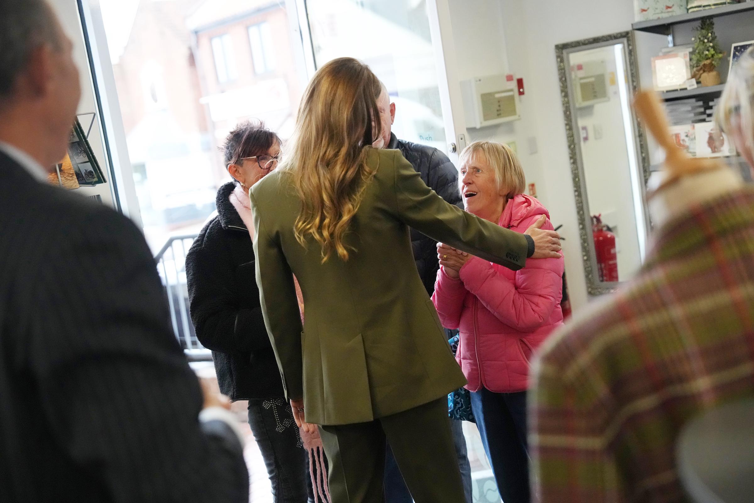Princess Catherine warmly greets shoppers at an EACH charity shop in Norfolk on October 22, 2026. During the visit, she spoke about the possibility of family plans as Prince George's school break approached. | Source: Getty Images