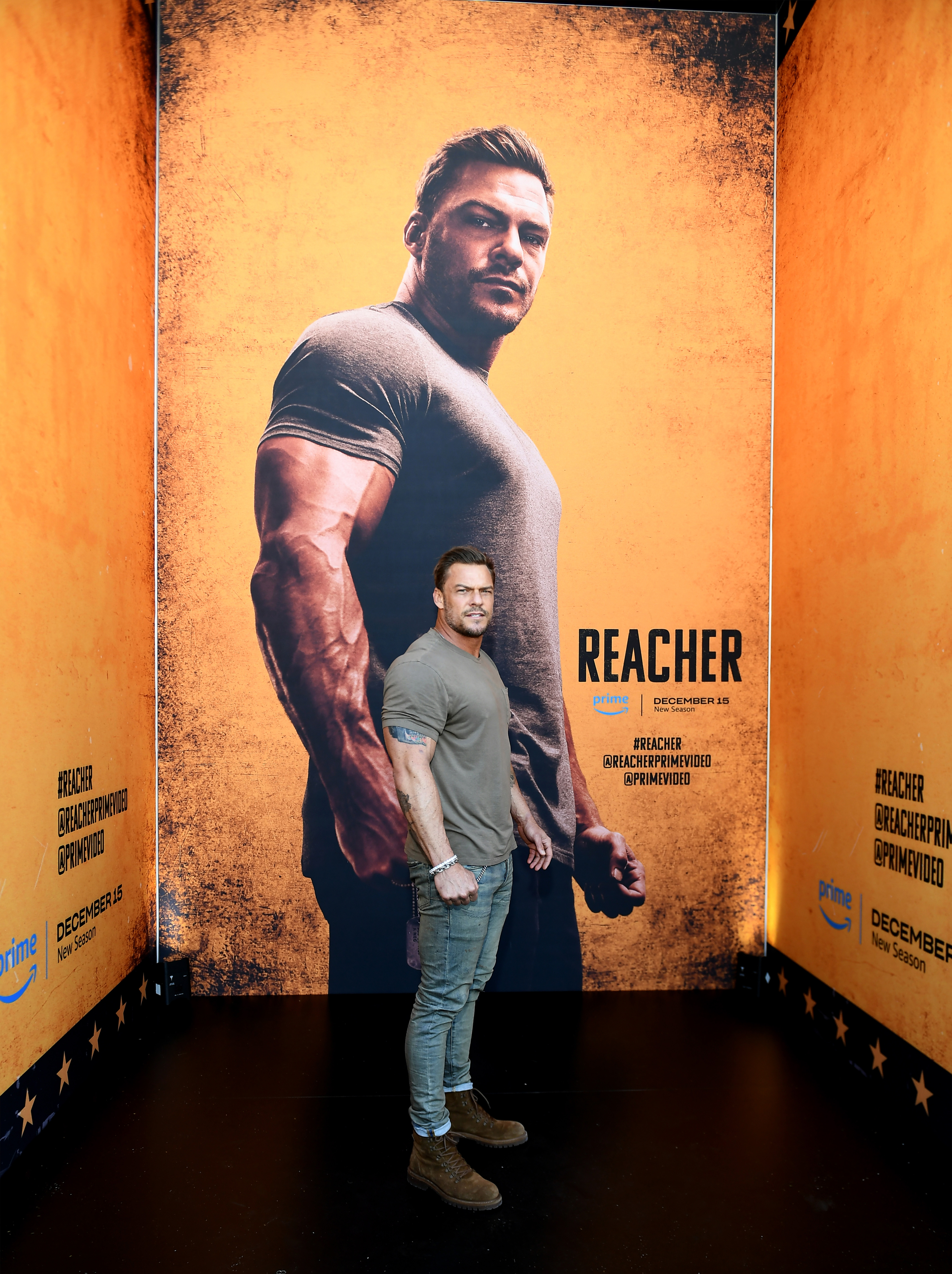 Alan Ritchson celebrates Season 2 of "Reacher" during Thursday Night Football at Allegiant Stadium in Las Vegas, Nevada on December 14, 2023. | Source: Getty Images