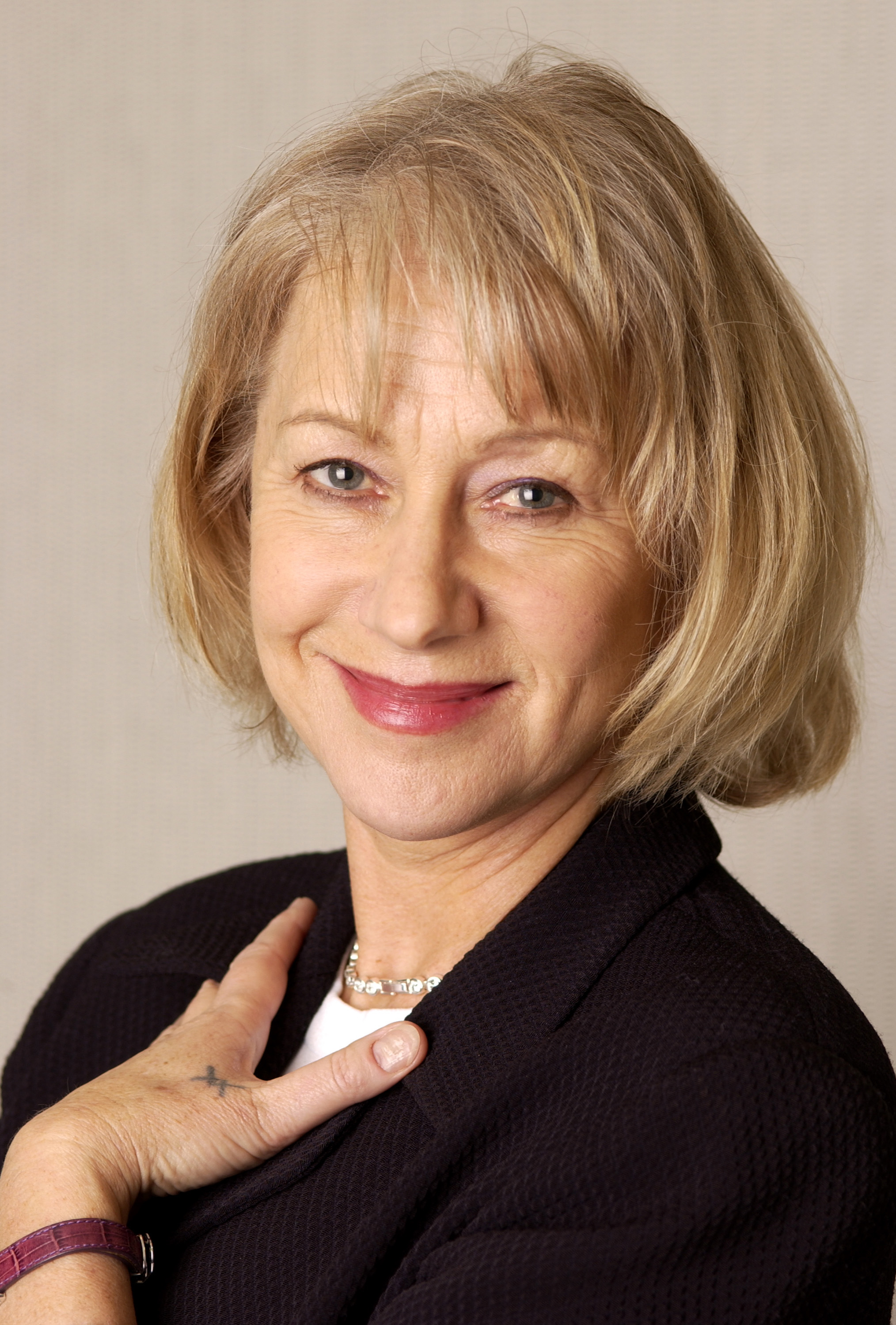 Helen Mirren during a studio photo session for "Last Orders," posing against a neutral background in New York | Source: Getty Images