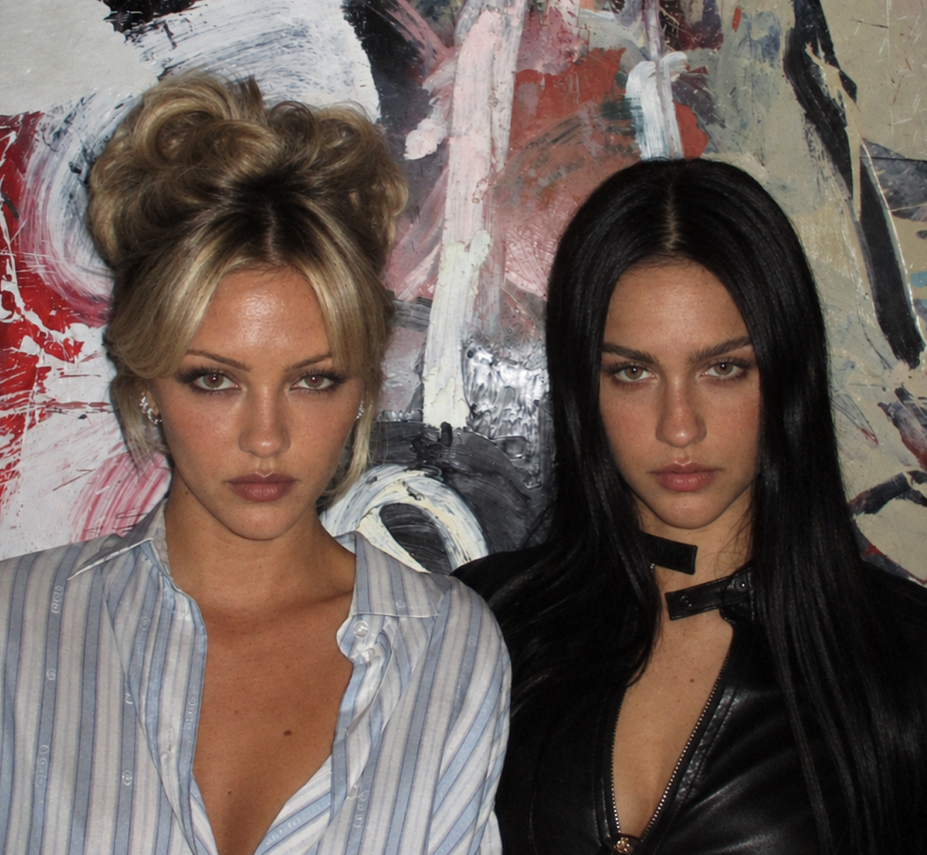 An AI-generated image places Delilah Belle Hamlin and Amelia Gray Hamlin side by side, highlighting the sisters' contrasting blonde and dark-haired looks. | Source: ChatGPT