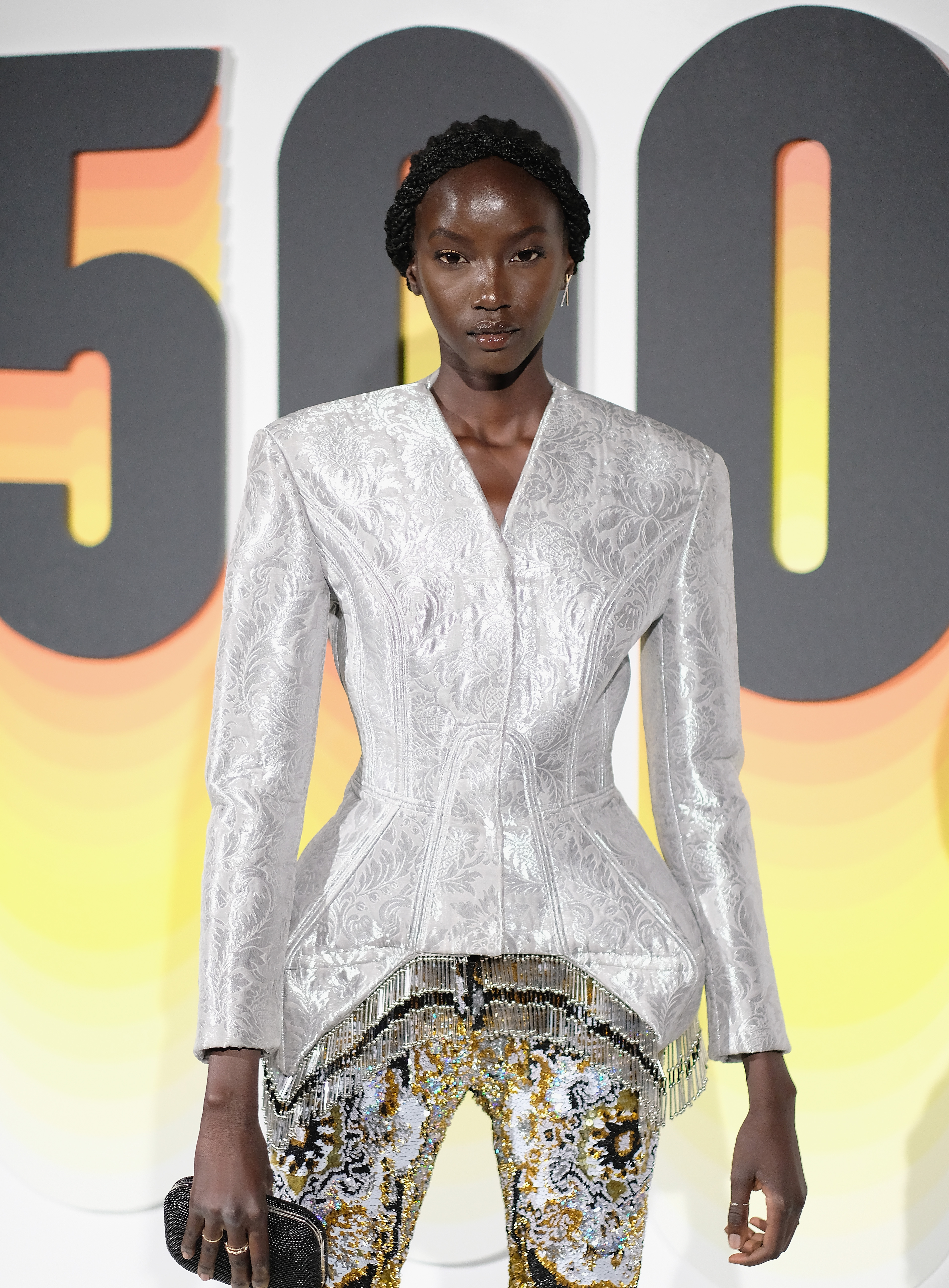 Anok Yai poses at the #BoF 500 gala dinner during New York Fashion Week on September 9, 2018 | Source: Getty Images