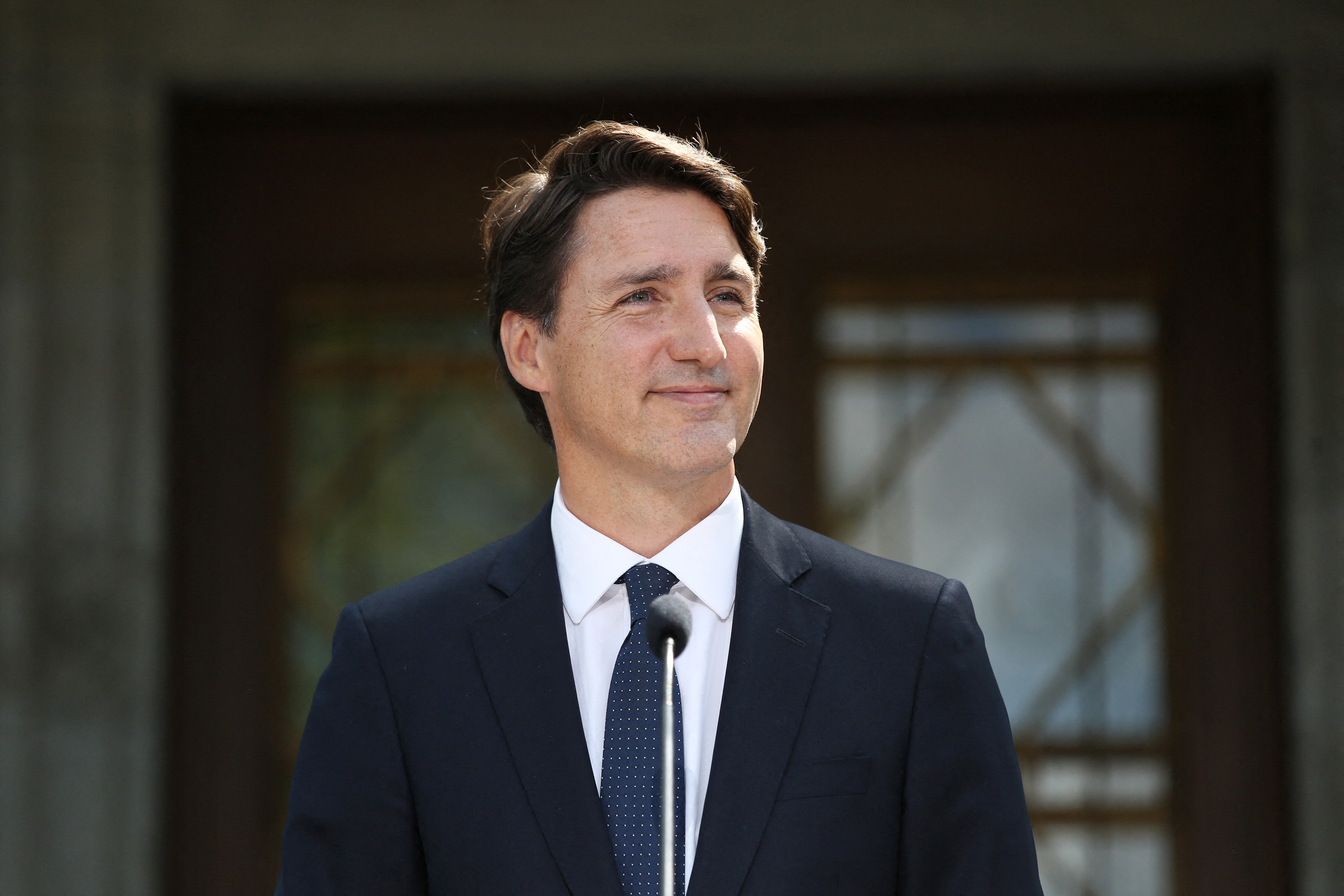 Long before his relationship with Perry made headlines, Trudeau was focused on leading Canada as prime minister. He was photographed at a news conference in Ottawa on August 15, 2021, when he announced a federal election. | Source: Getty Images