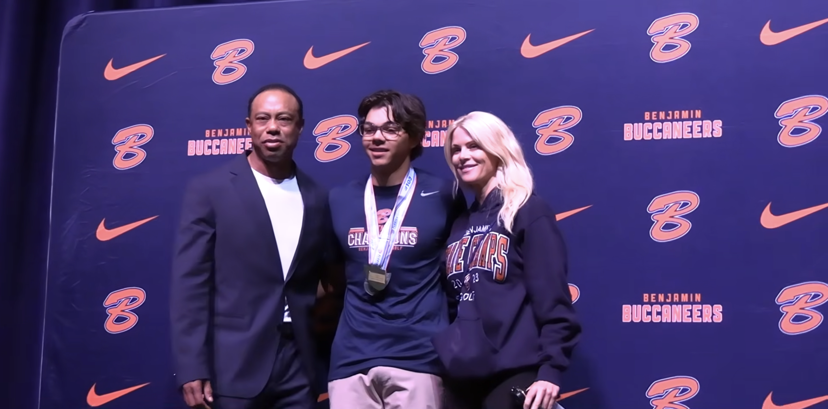 Charlie Woods and his parents celebrating his second state title during the Benjamin School ring ceremony on February 24, 2026 | Source: YouTube/ESPN West Palm