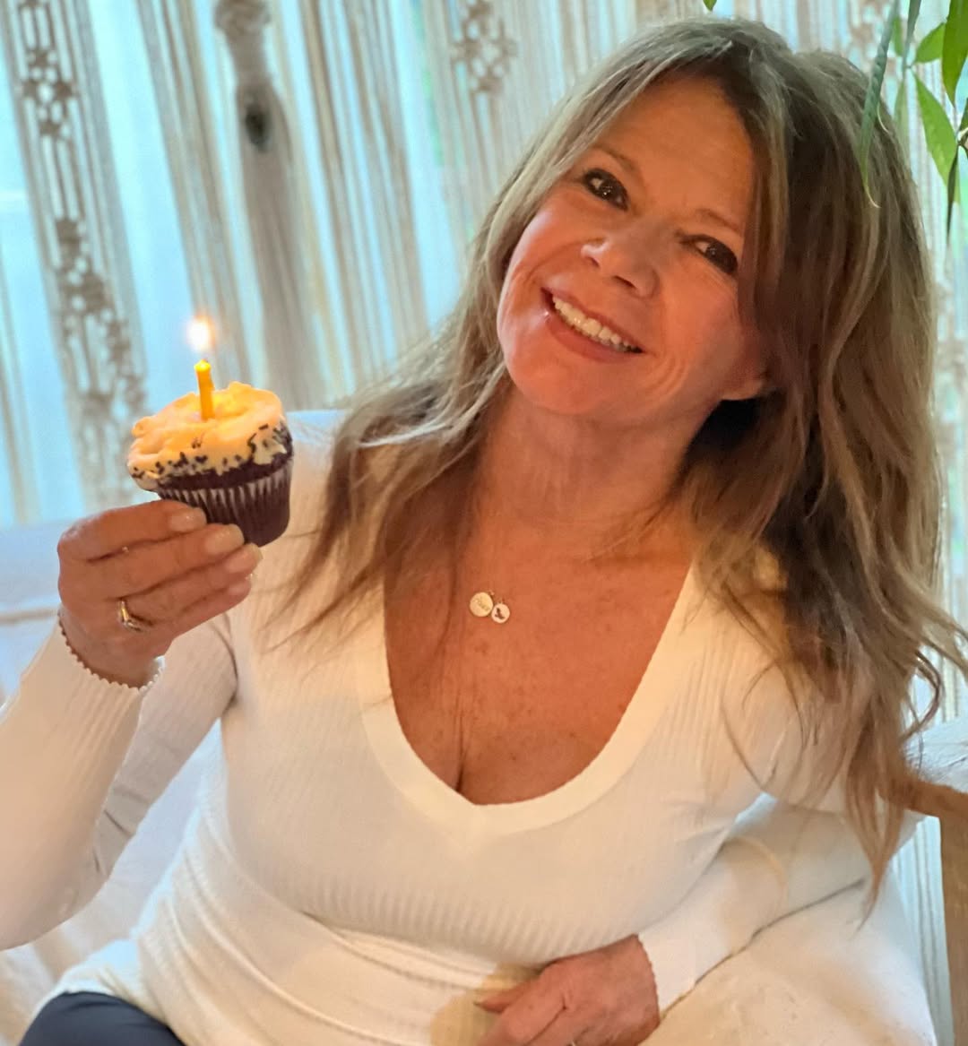 Mary-Margaret Humes holds a cupcake while celebrating in a photo shared on Instagram in April 2023 | Source: Instagram/thereal_marymargarethumes
