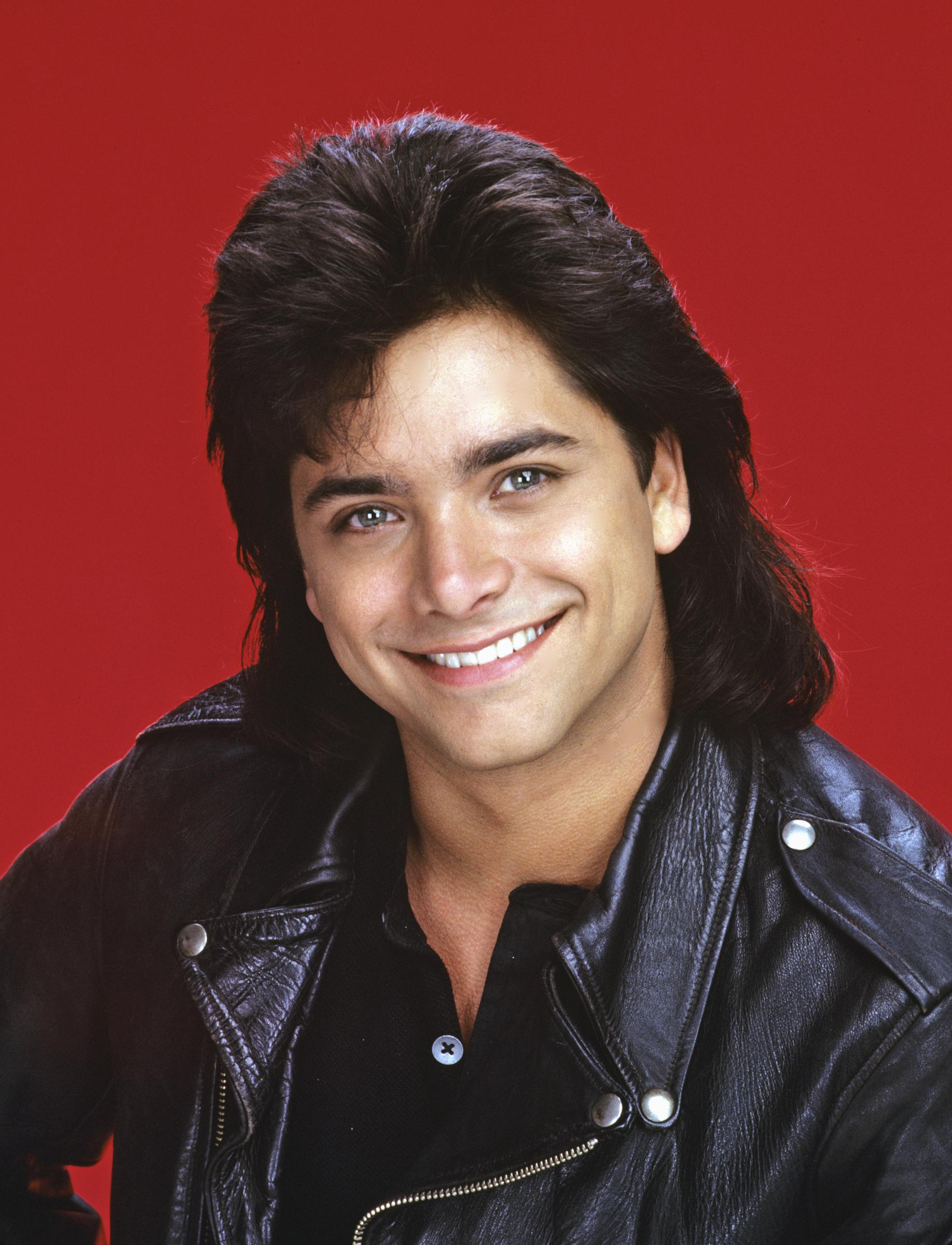 John Stamos turned Uncle Jesse into one of "Full House"'s most unforgettable characters with his trademark confidence and unmistakable style. His popularity on the sitcom helped make him one of the breakout stars of the series. | Source: Getty Images