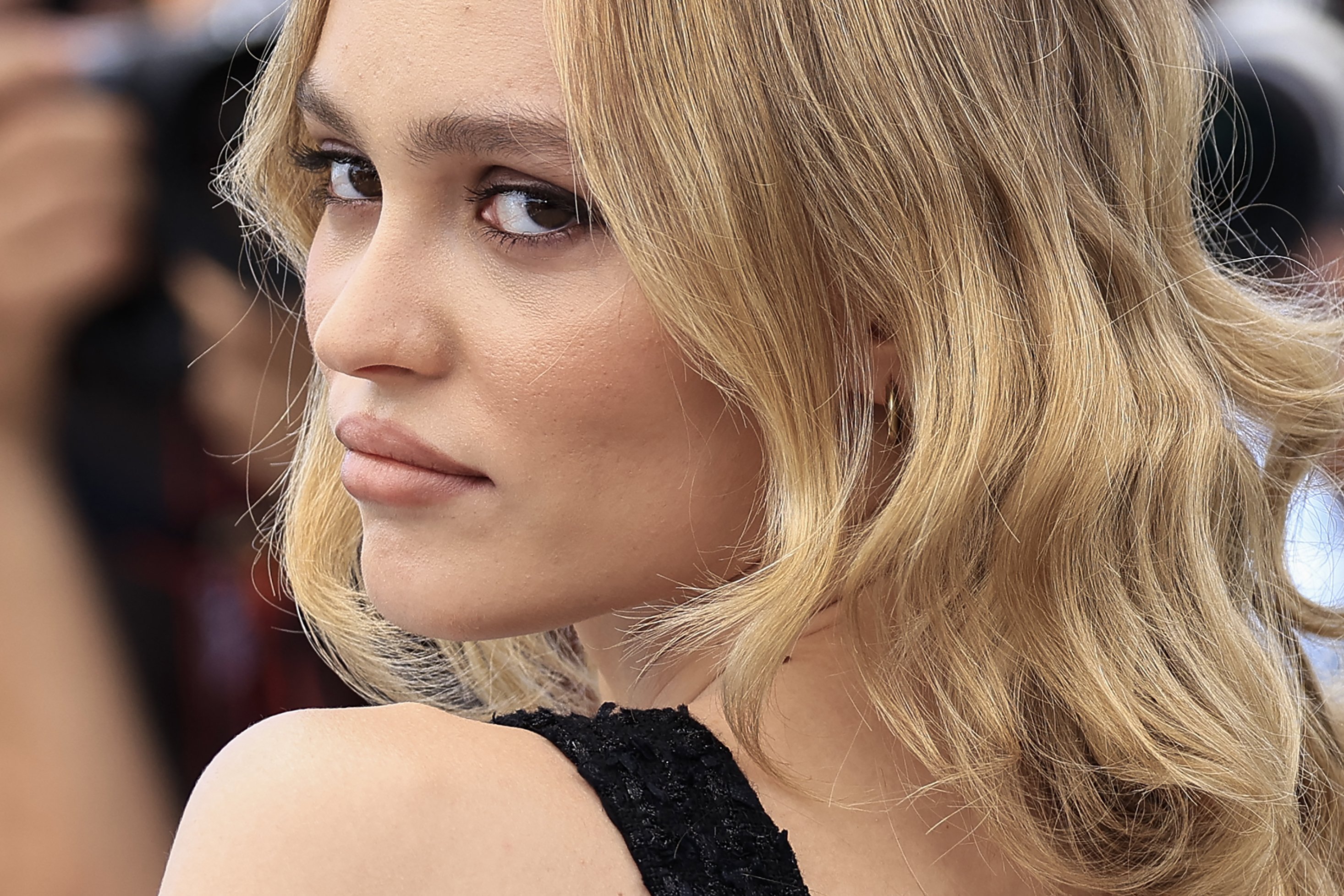 Lily-Rose Depp appeared at the 2023 Cannes Film Festival to promote "The Idol," the television series in which she played Jocelyn. Her appearance at the photocall came during a career that has included both leading roles and public debate about her performances. | Source: Getty Images