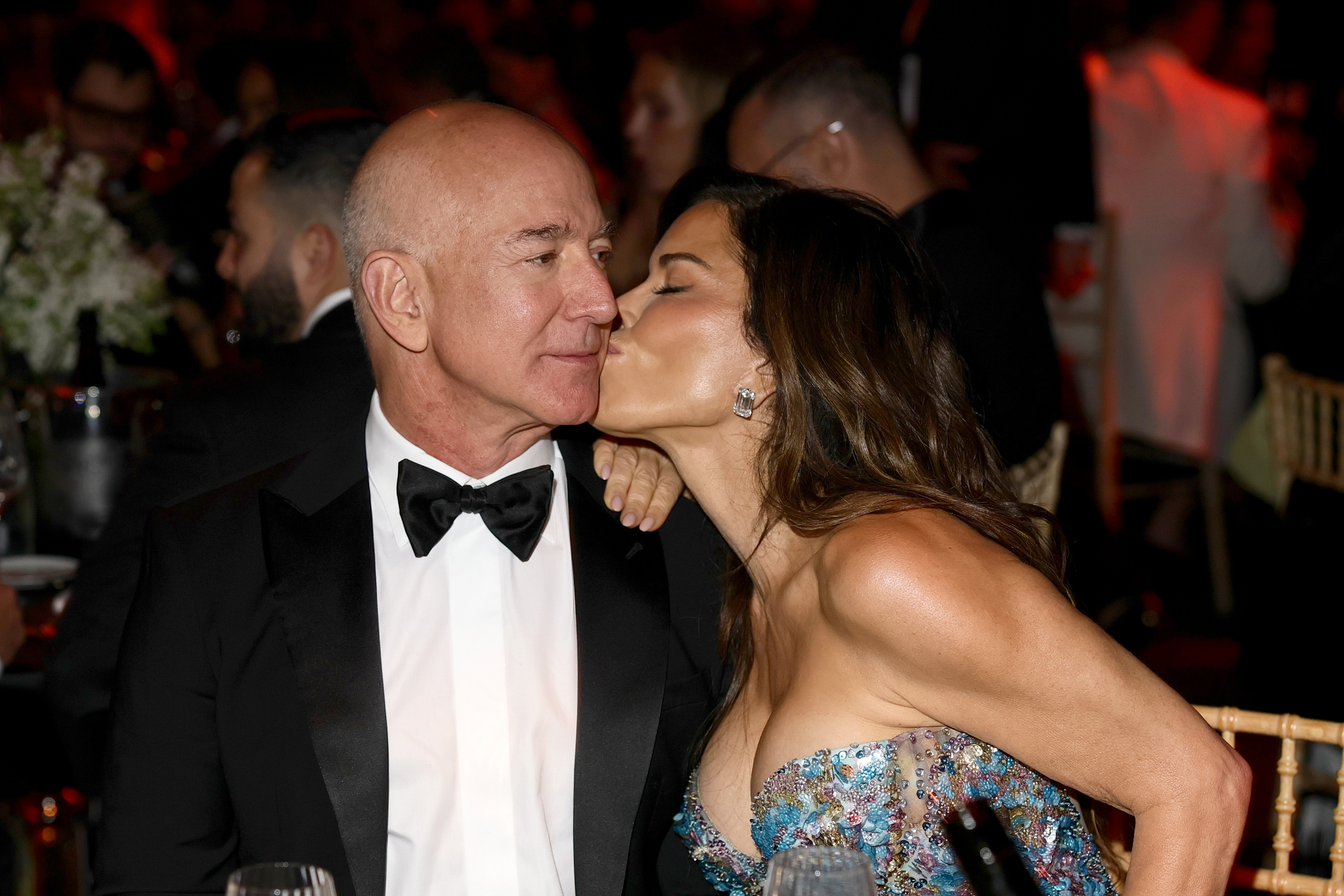 Lauren Sanchez kisses Jeff Bezos on the cheek during the amfAR Gala Cannes 2025 at Hotel du Cap-Eden-Roc on May 22, 2025, in Cap d’Antibes, France | Source: Getty Images