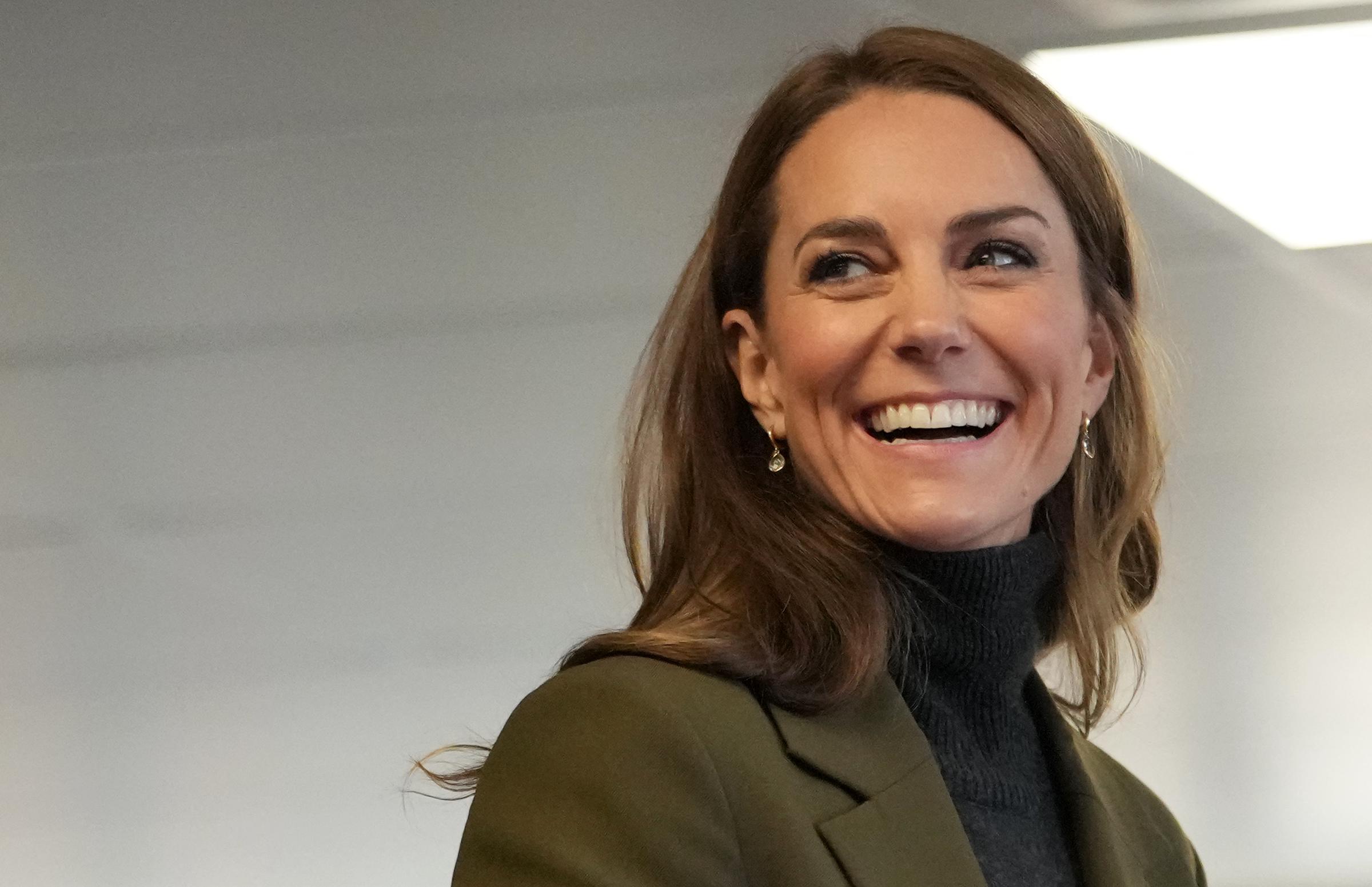 Princess Catherine smiles during her visit to the charity shop in Hoveton, Norfolk. The mother of three also shared how excited she was to have all her children home for the upcoming school break. | Source: Getty Images