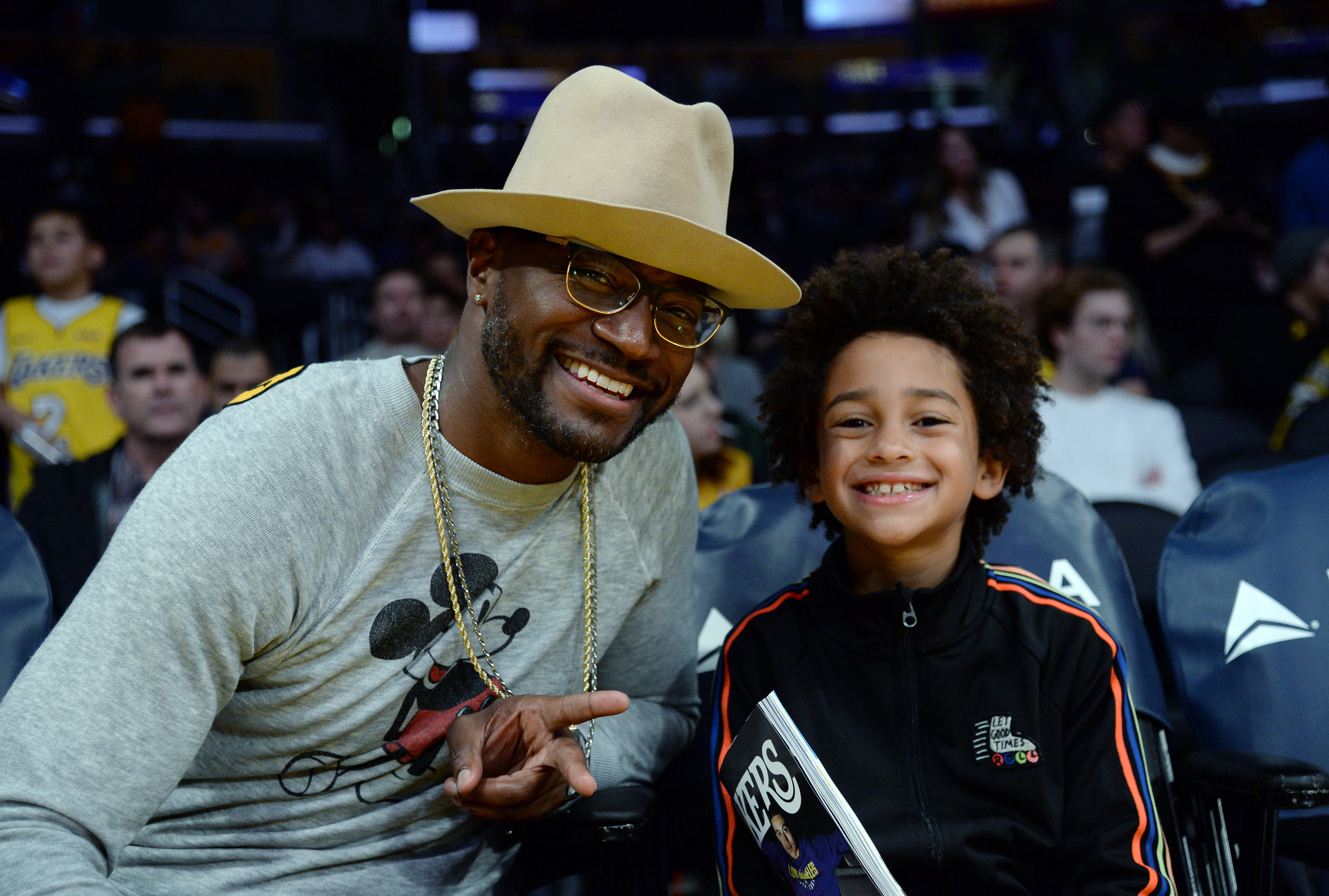 Taye Diggs and Walker Diggs attend a basketball game between the Indiana Pacers and Los Angeles Lakers at Staples Center on January 19, 2018, in Los Angeles, California | Source: Getty Images