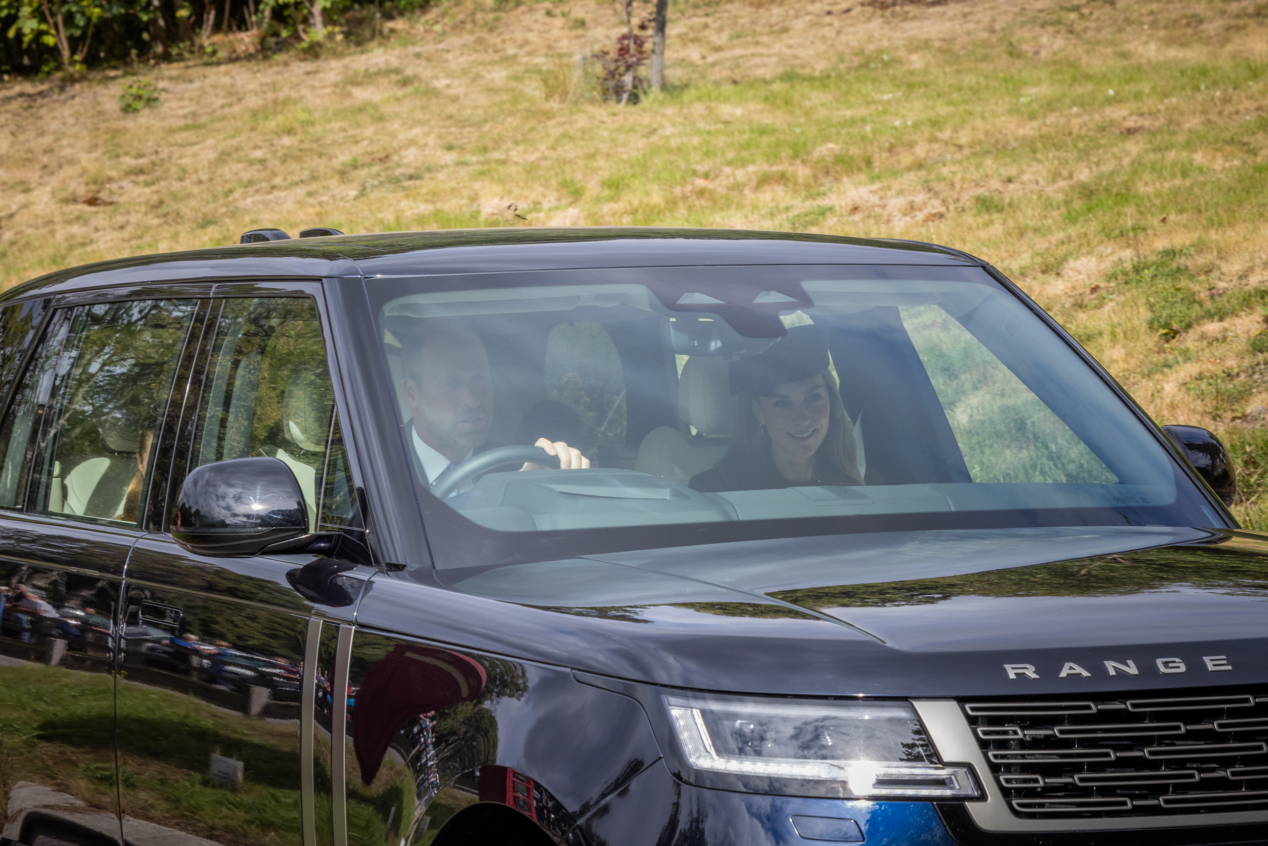 Prince William, Prince of Wales, Catherine, Princess of Wales, and Princess Charlotte of Wales arrive by car at Crathie Kirk to attend the church service on August 24, 2025 in Crathie, Aberdeenshire | Source: Getty Images