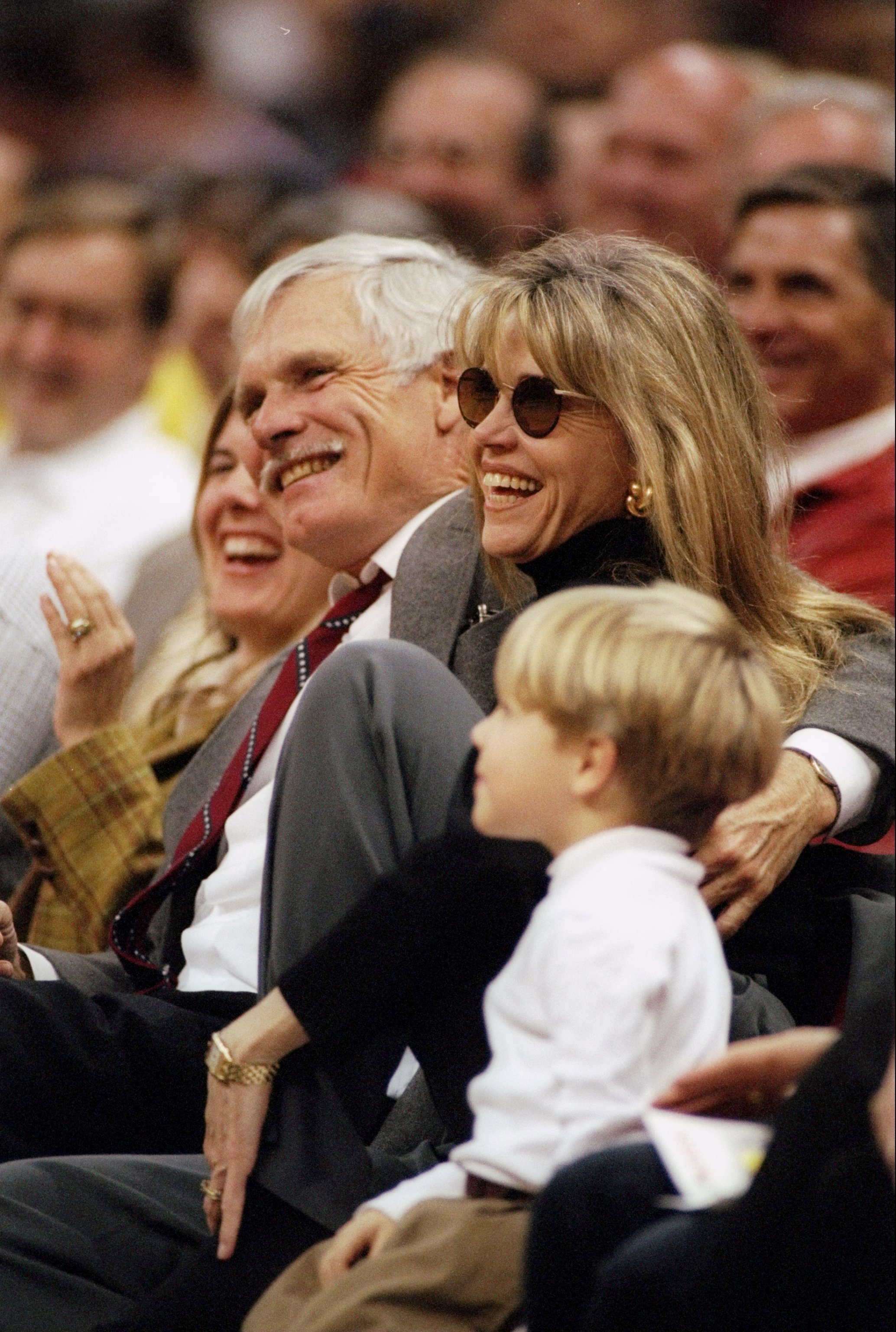Ted Turner and Jane Fonda look on during a game between the Denver Nuggets and the Atlanta Hawks on December 10, 1996 | Source: Getty Images