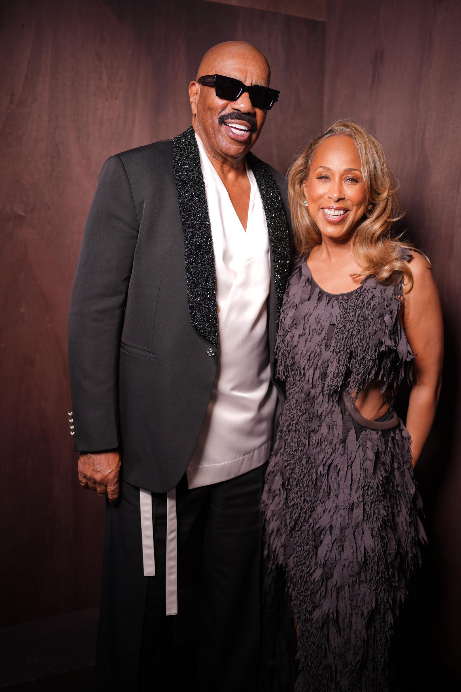 Majorie and Tv host Steve Harvey rock Louis Vuitton outfits during the Paris Fashion week Men's Spring/Summer 2026 in Paris, Franco on June 24, 2025 | Source: Getty Images