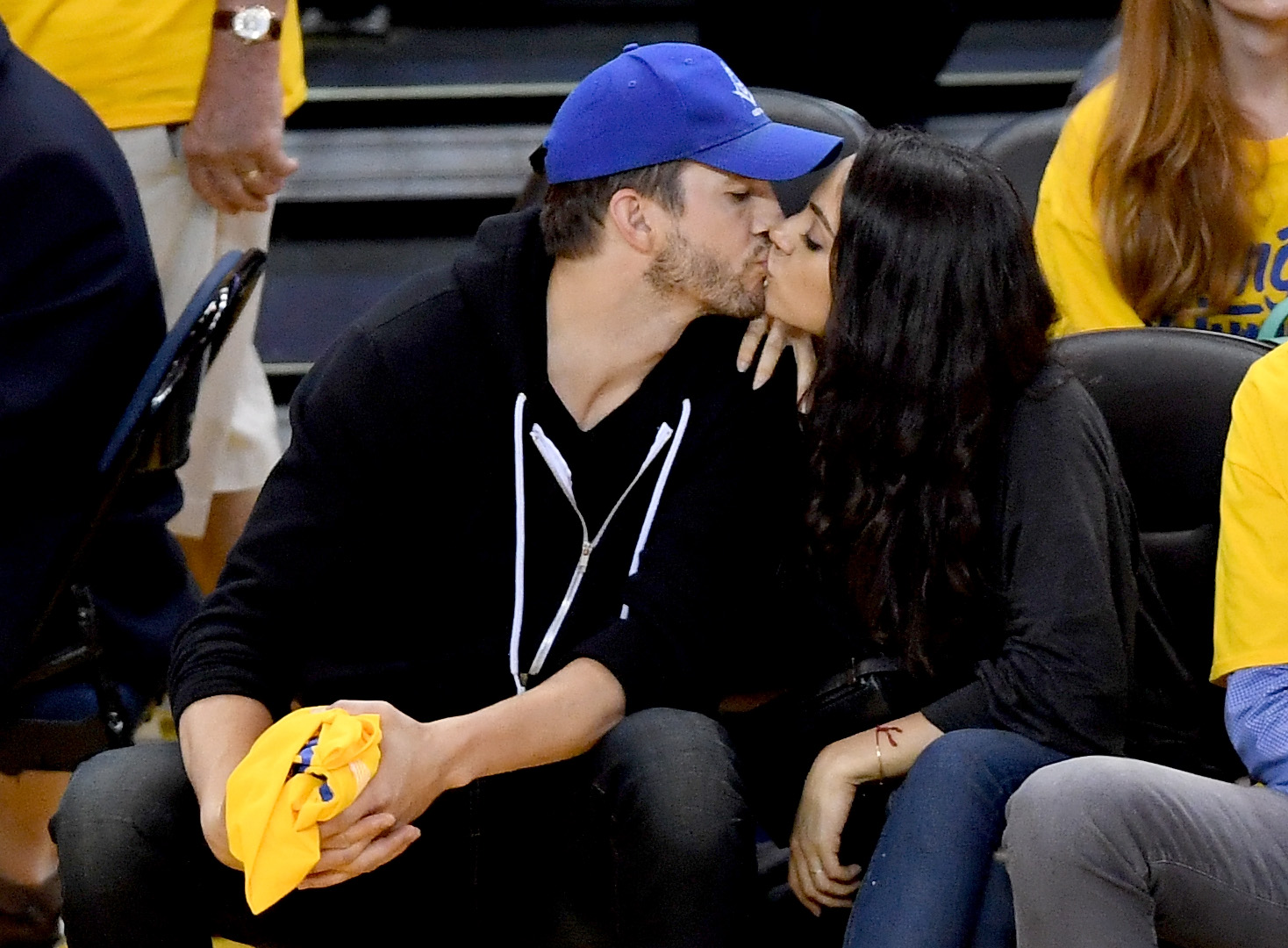 Ashton Kutcher and Mila Kunis during Game 2 of the 2016 NBA Finals between the Golden State Warriors and the Cleveland Cavaliers at ORACLE Arena on June 5 in Oakland, California. | Source: Getty Images