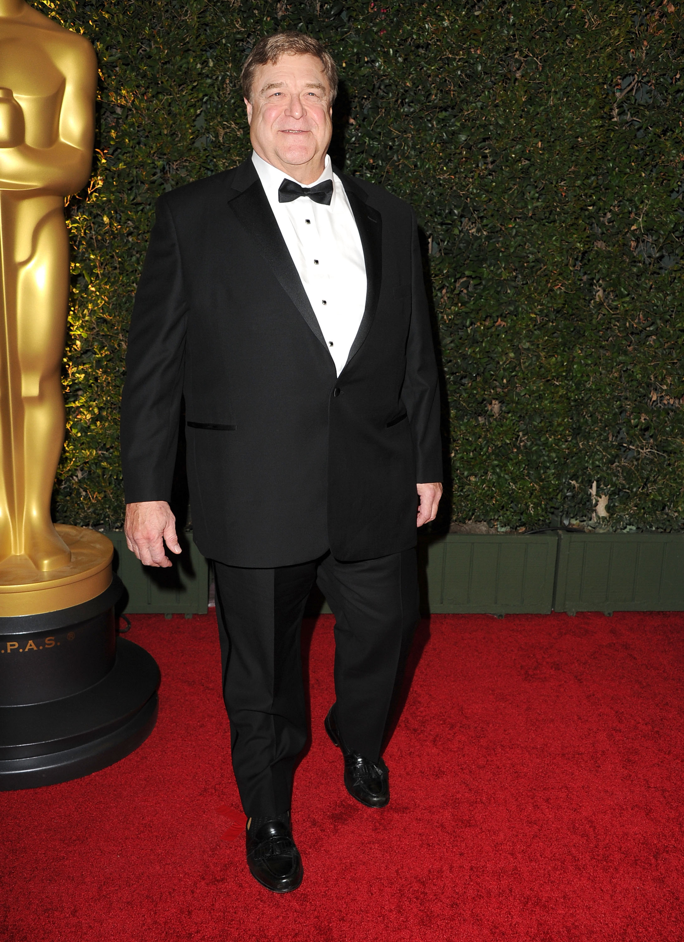 John Goodman arrives at the Academy of Motion Picture Arts and Sciences’ Governors Awards at Dolby Theatre on November 16, 2013, in Hollywood, California, continuing to maintain the healthier habits that had transformed his appearance. | Source: Getty Images