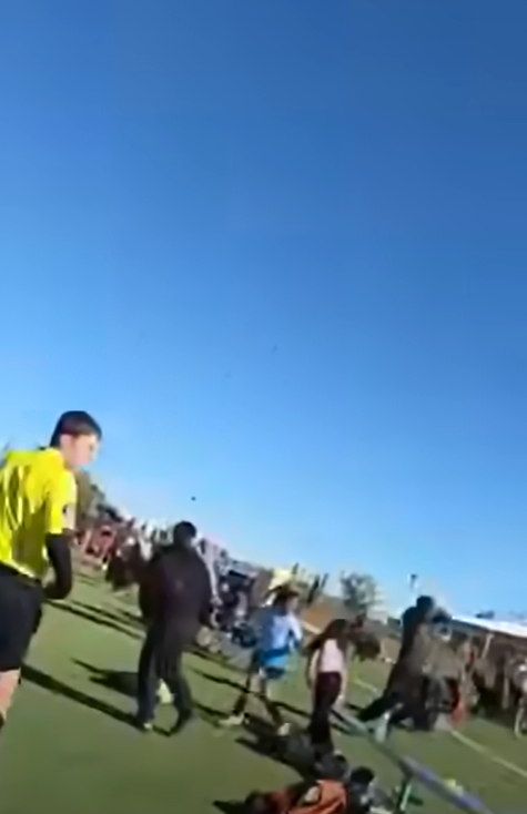 Spectators and players move across the soccer field at Stryker Sports Complex in Wichita, Kansas, as the situation unfolds on October 17, 2026. The incident left two people dead and 10 injured, with investigators continuing to examine the circumstances surrounding the crash. | Source: Facebook/Abby Blabby- True Crime & News
