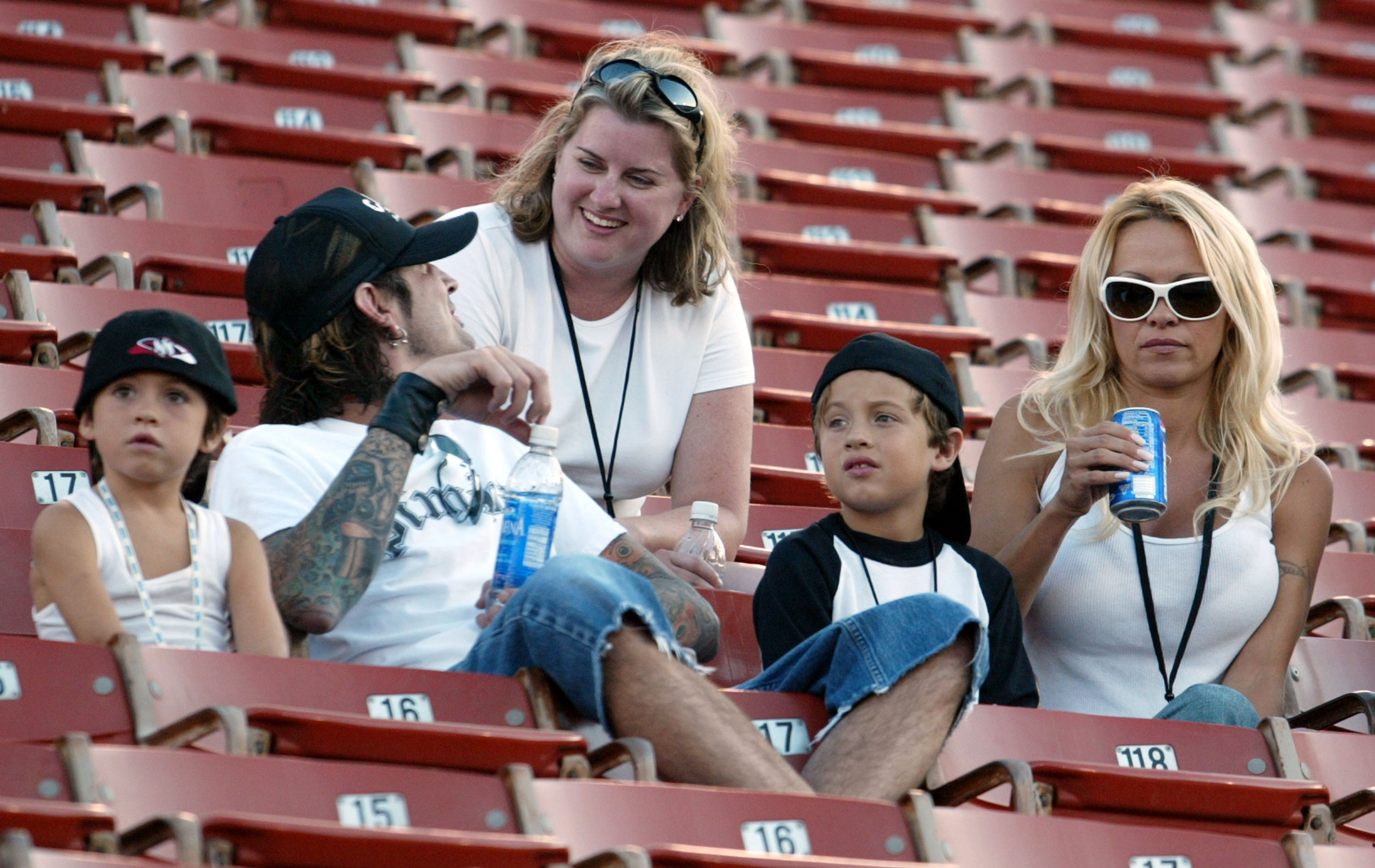 By this 2003 family outing, Anderson had already spoken publicly about how she believed she contracted hepatitis C. She said her doctor suspected a shared tattoo needle with Tommy Lee, pictured with her and their sons, while Lee reportedly denied having the infection. | Source: Getty Images