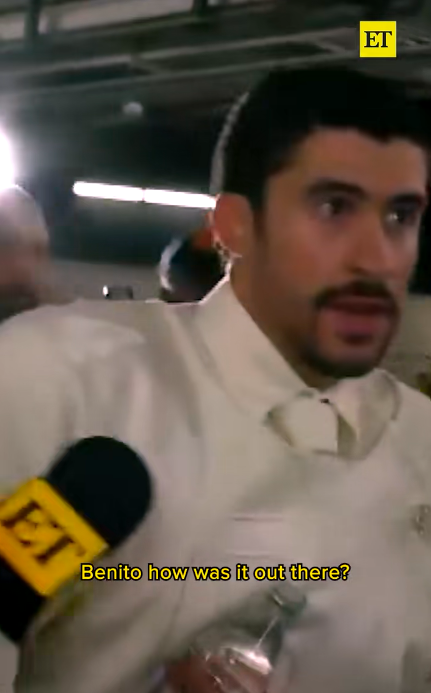 Bad Bunny walking as a reporter asks him about his performance. | Source: TikTok/@entertainmenttonight