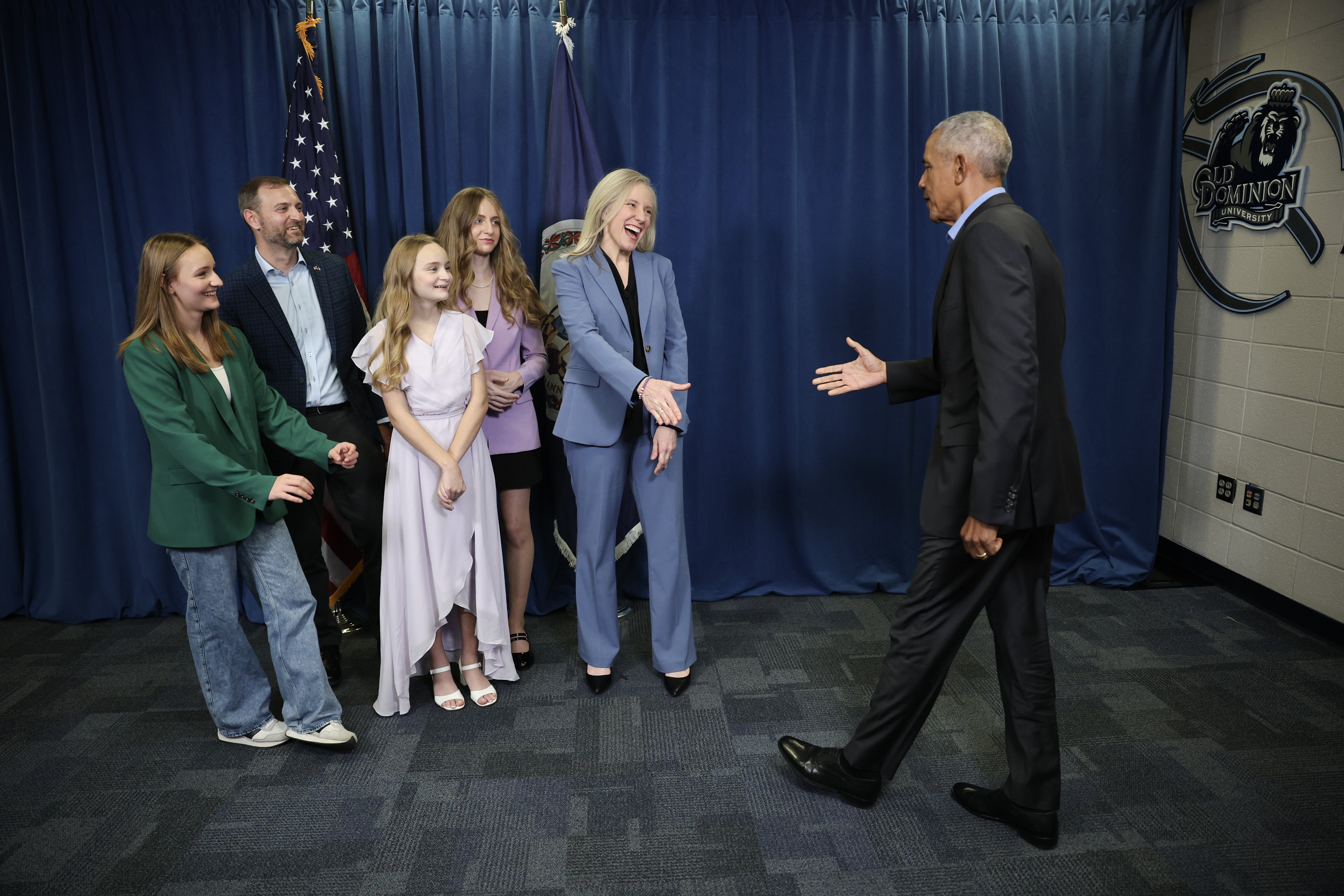 Former U.S President Barack Obama greets Virginia Democratic gubernatorial candidate, former Rep. Abigail Spanberger and her family before a campaign rally in the Chartway Arena on November 1, 2025 in Norfolk, Virginia | Source: Getty Images