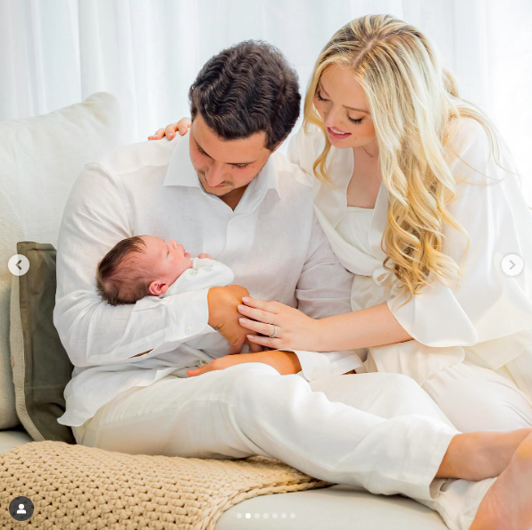 Michael Boulos cradling Alexander Trump Boulos as Tiffany Trump envelops both of them. | Source: Instagram/tiffanytrump