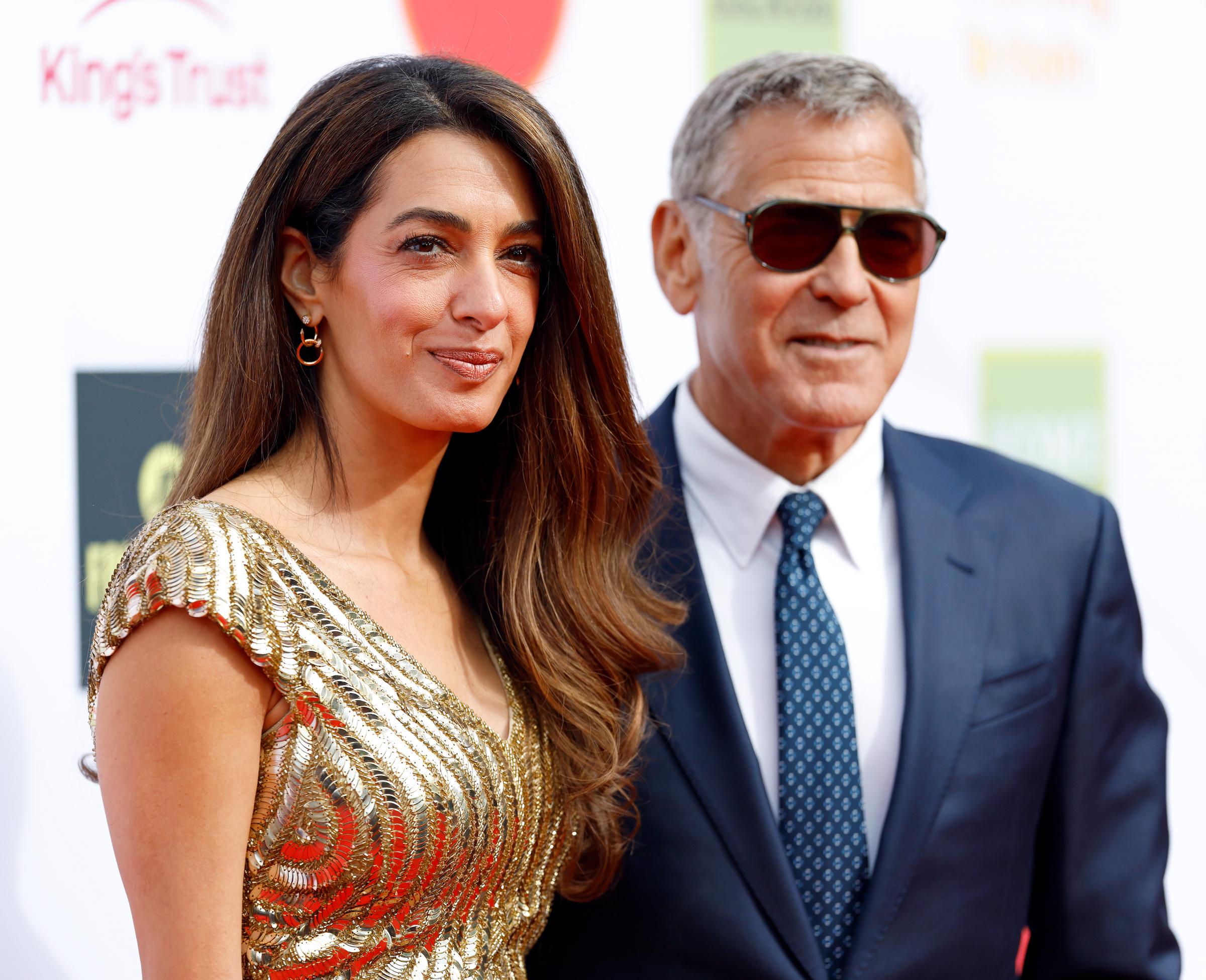 George and Amal Clooney's latest outing reignited plenty of online chatter about both of them, from admiration for their relationship to surprise over their appearances. The couple have long attracted attention together, but these new Lake Como images sparked an especially lively response. | Source: Getty Images