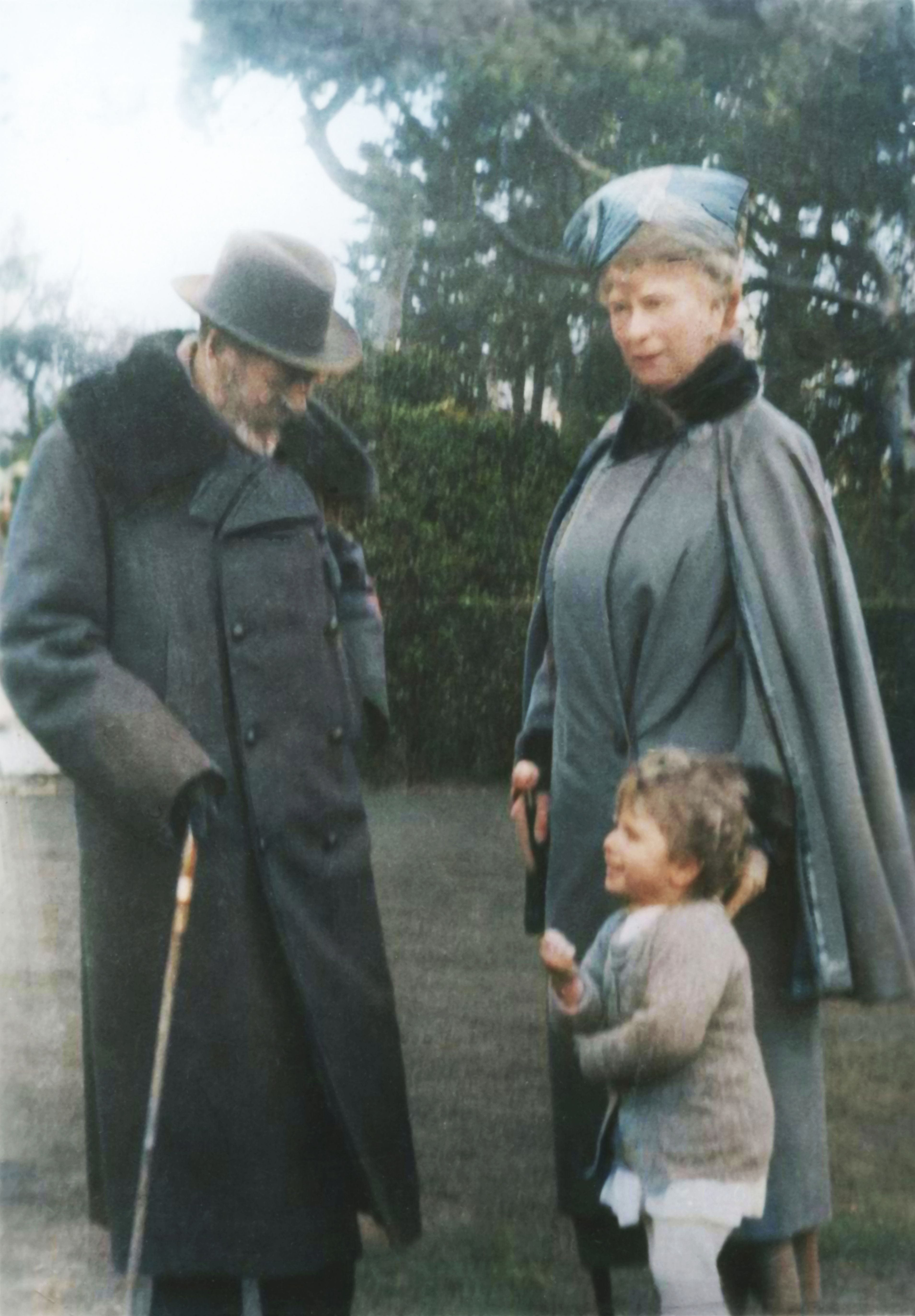 King George V and Queen Mary were pictured with their young granddaughter, the future Queen Elizabeth II, around 1930. George V had adopted Windsor as both the Royal House name and his family's surname in 1917, establishing the modern naming system Elizabeth would later inherit. | Source: Getty Images