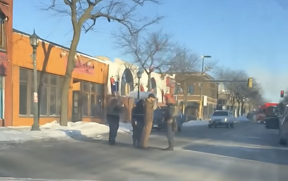 Bystander footage showing Alex Pretti facing ICE agents in Minnesota on January 24, 2026 | Source: YouTube/Newsweek