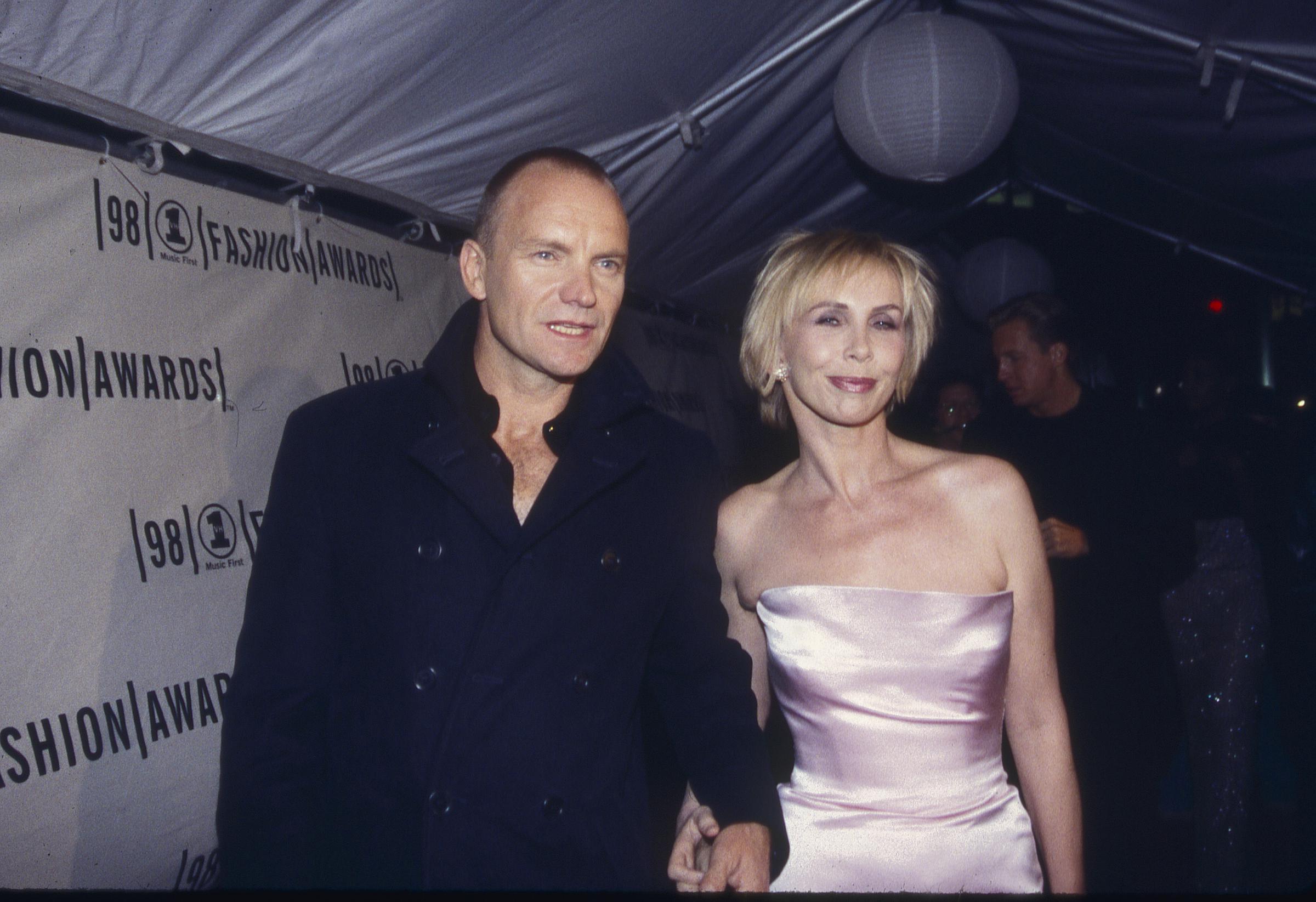 Trudie Styler, at 44, showed her soft, slightly elongated face, featuring thin, high-arched eyebrows, a demure smile with closed lips, and a close-cropped blonde hairstyle with a side part, while attending the 1998 VH1 Fashion Awards with Sting on October 12, 1998, in New York.