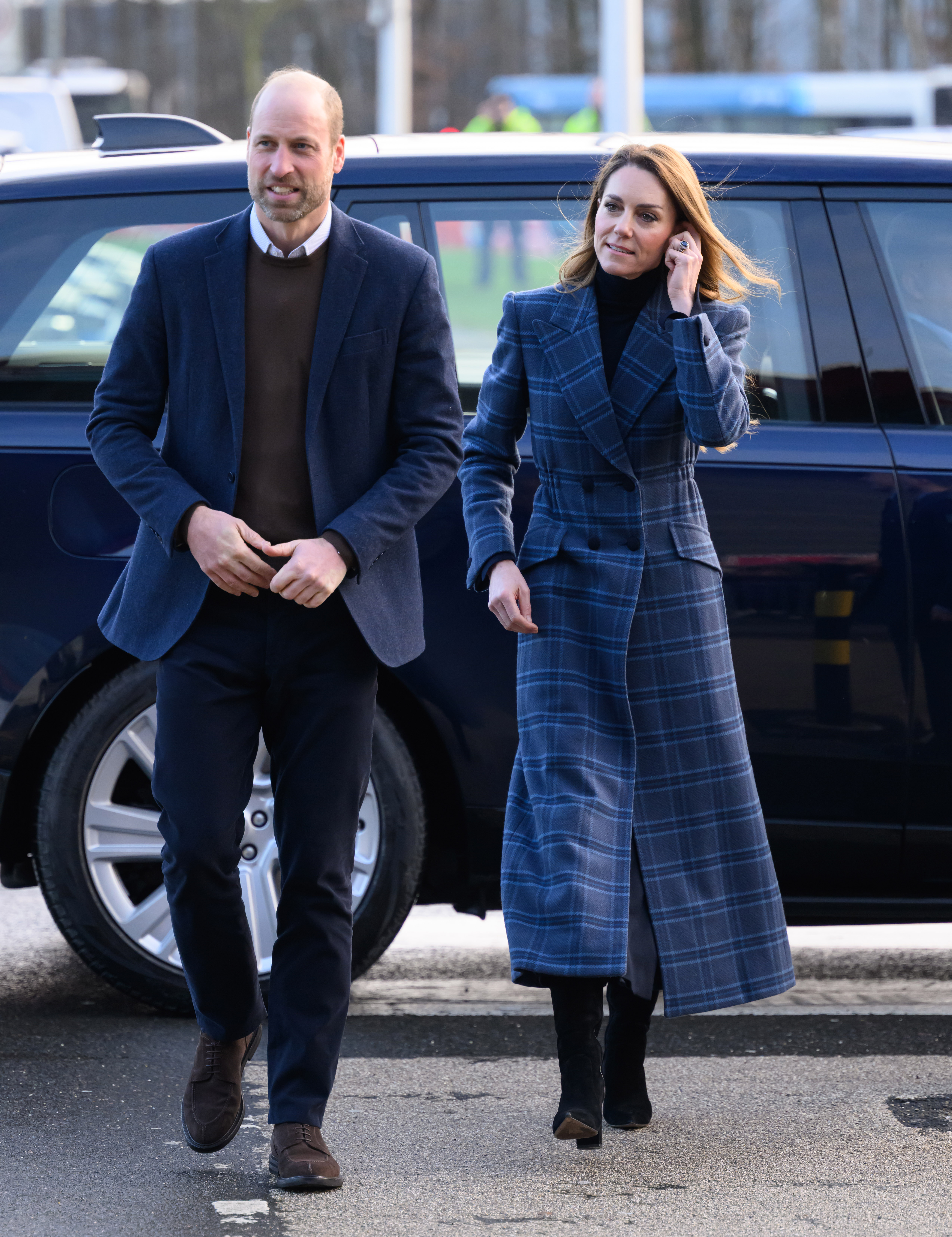 Catherine wore the tartan coat during her Scotland engagements, 1 day before Camilla appeared in her own checked look in Cheltenham. | Source: Getty Images