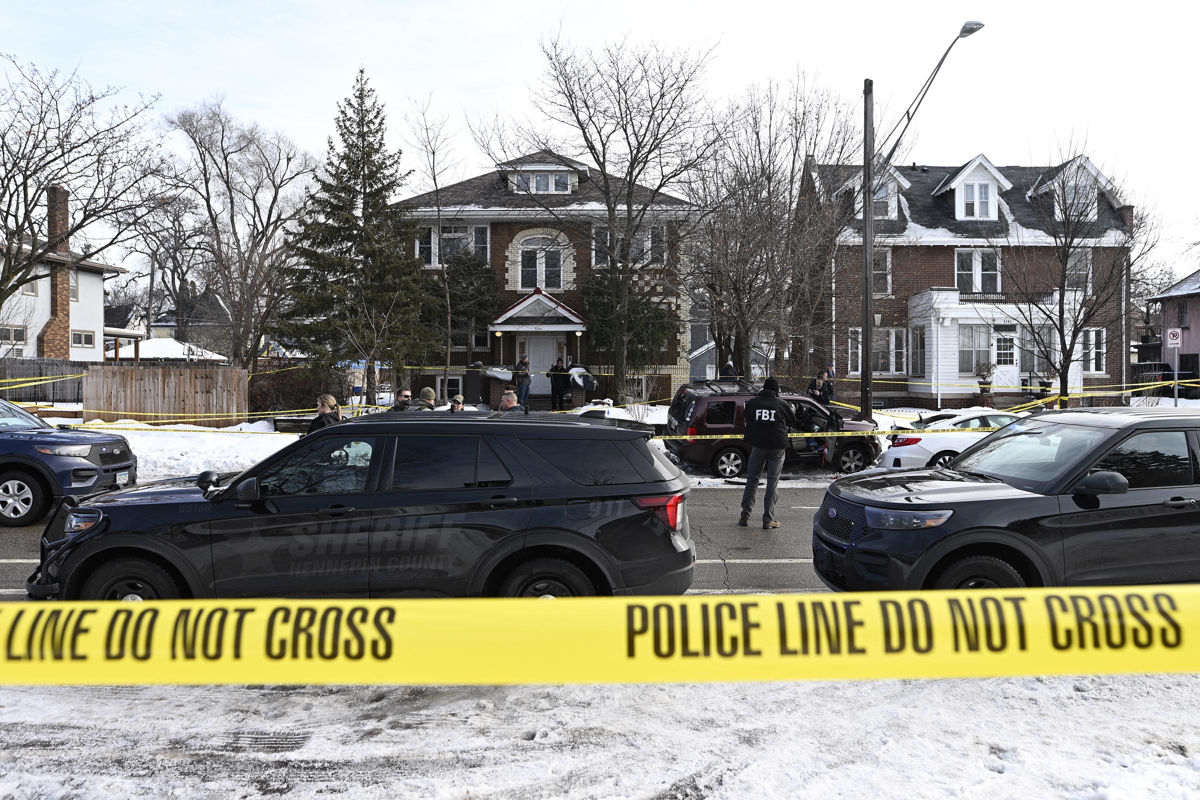 Members of law enforcement work the scene following a suspected shooting by an ICE agent during federal law enforcement operations on January 7, 2026, in Minneapolis, Minnesota | Source: Getty Images