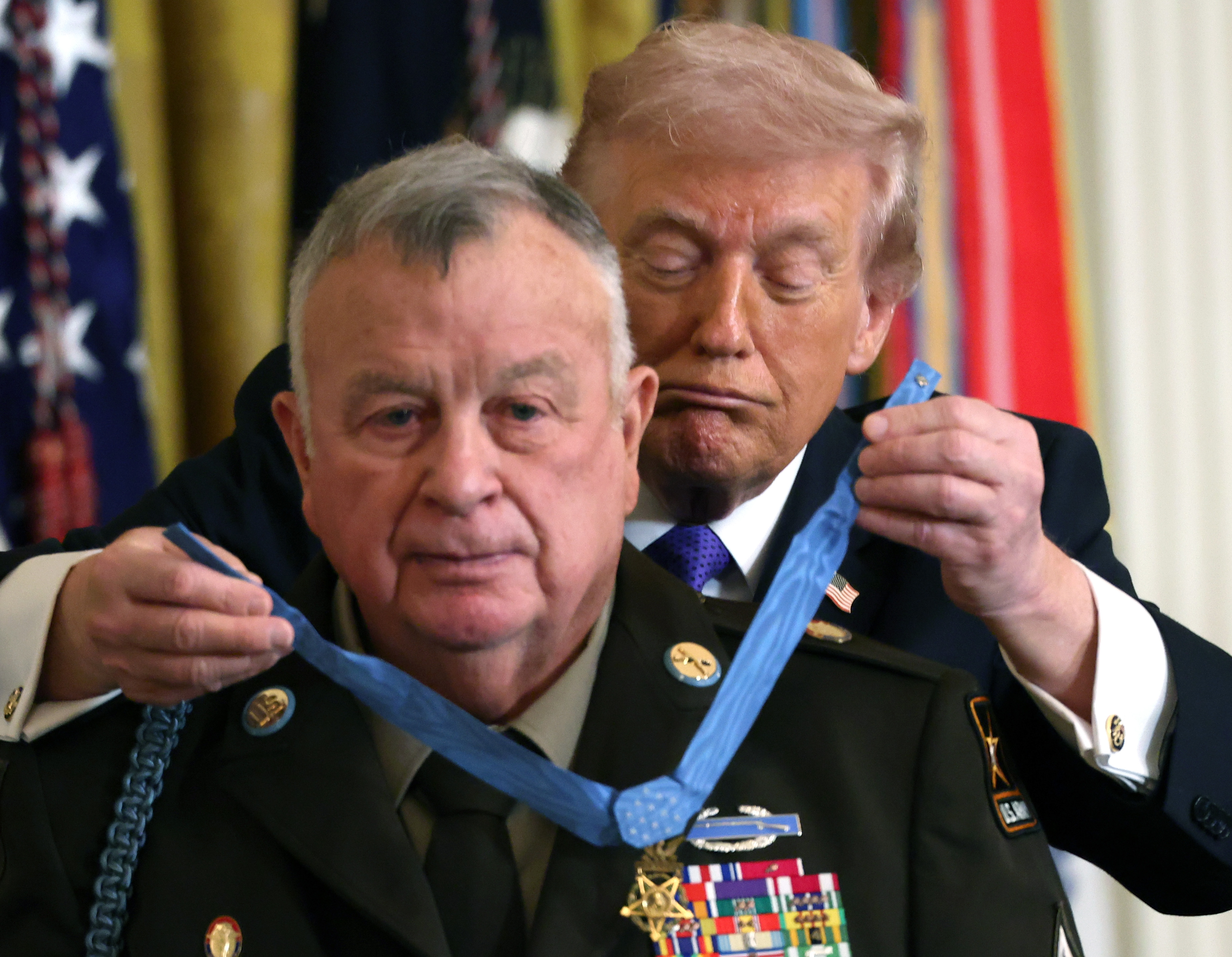 Ret. Command Sgt. Maj. Terry P. Richardson is presented the Medal of Honor by Donald Trump during a Medal of Honor Ceremony in the East Room of the White House on March 2, 2026, in Washington, DC | Source: Getty Images