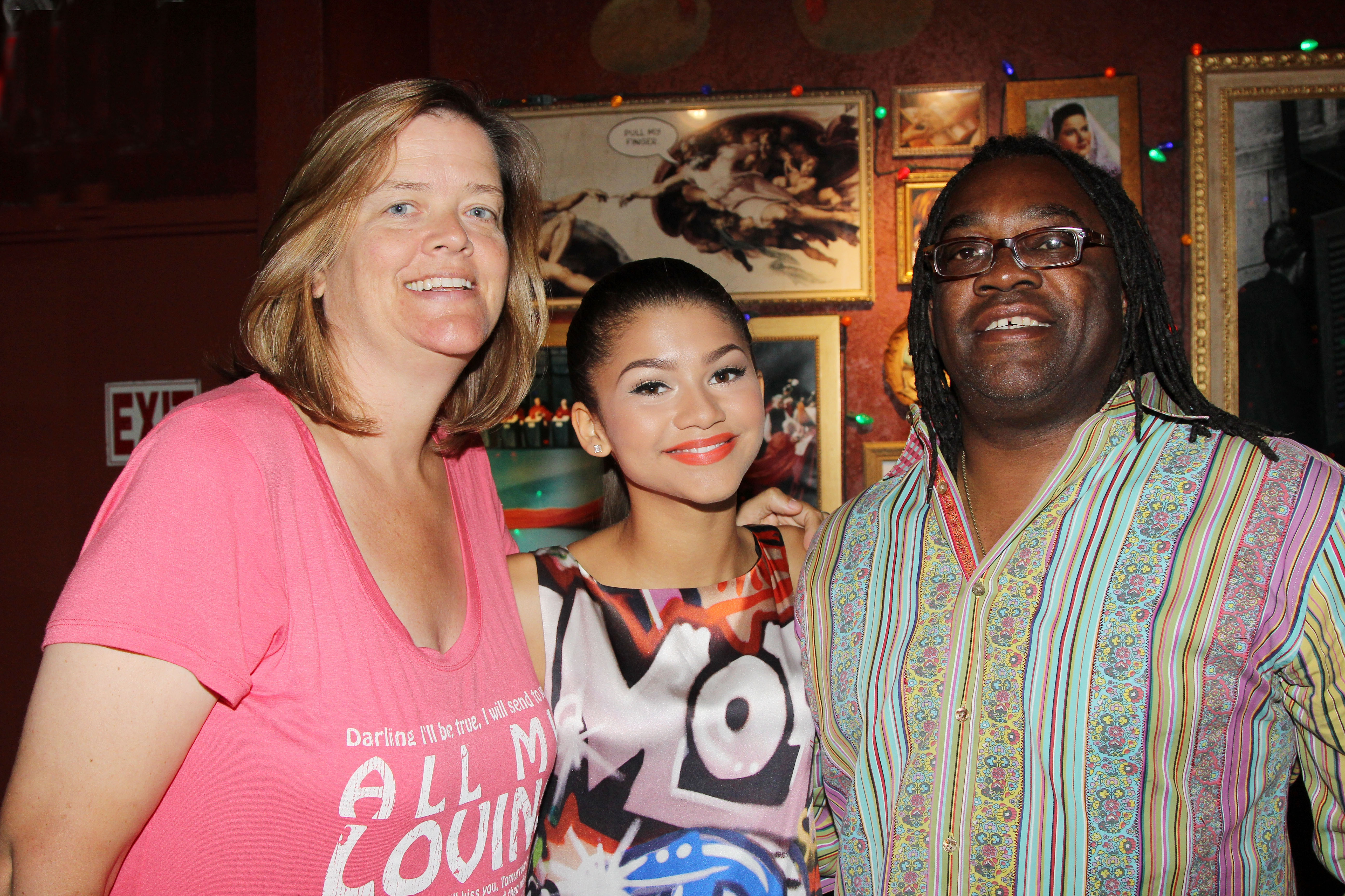 Claire Stoermer and Kazembe Ajamu Coleman are with their daughter Zendaya as they visit Buca di Beppo Times Square in New York City on July 15, 2013. | Source: Getty Images