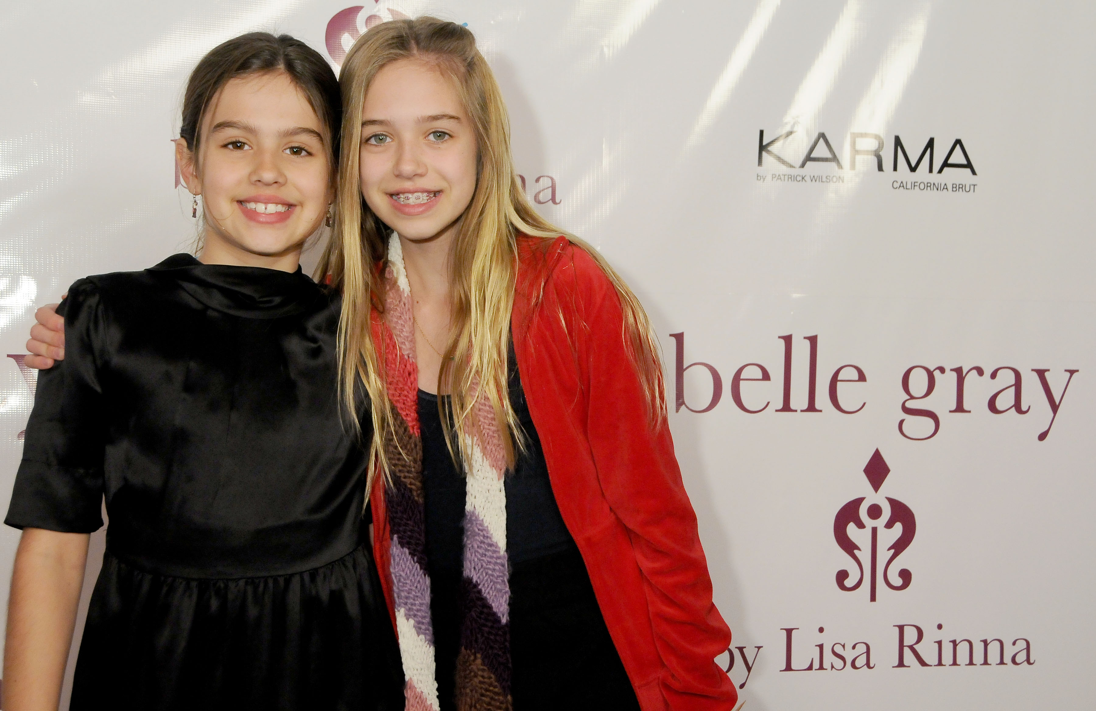 Amelia Gray Hamlin and Delilah Belle Hamlin arrive at the 7th anniversary of Harry Hamlin and the reality star's boutique, "Belle Grey", on February 12, 2010, in Sherman Oaks, California | Source: Getty Images