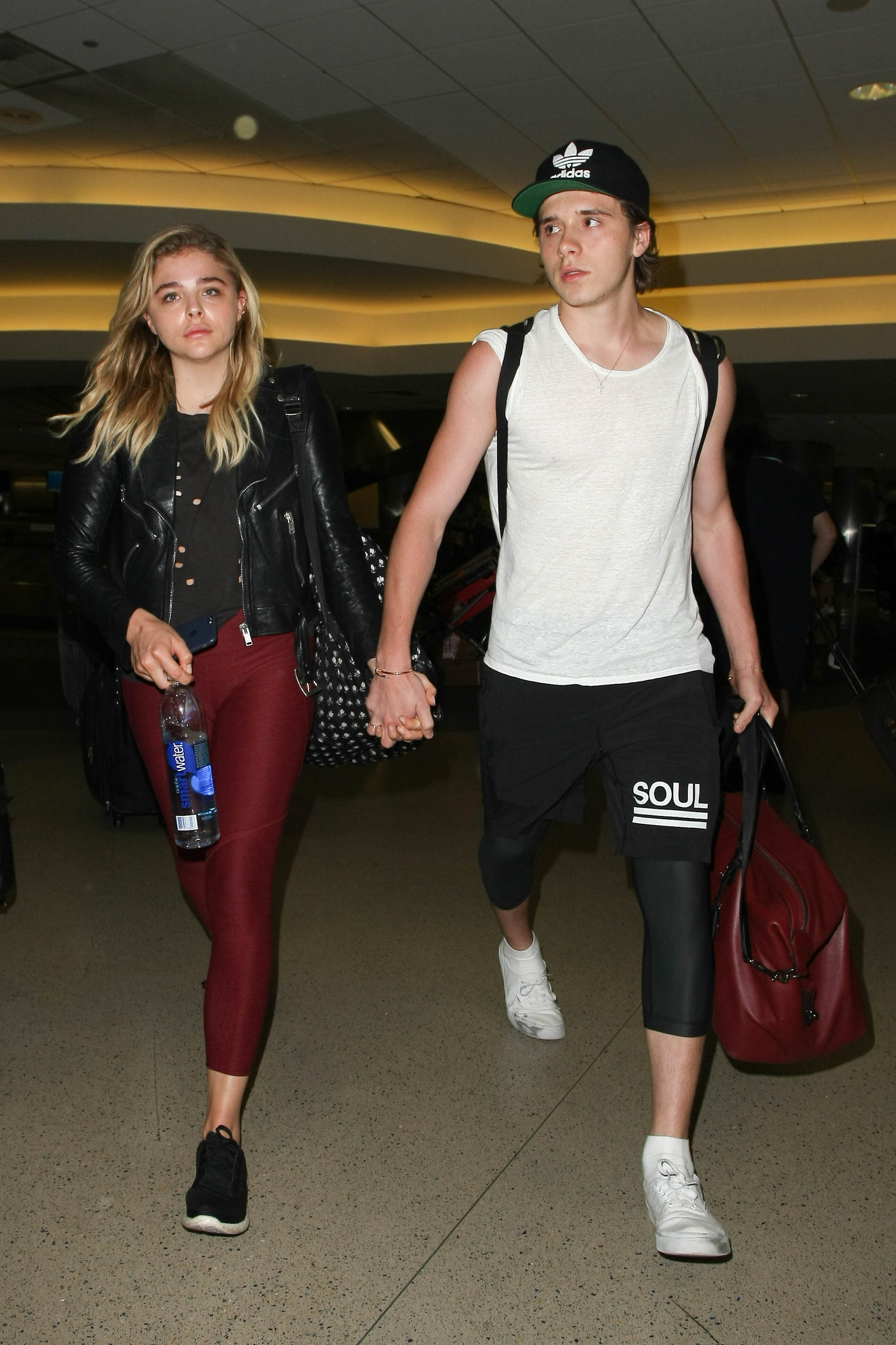Chloe Moretz and Brooklyn Beckham are seen at LAX in Los Angeles, California on June 30, 2016 | Source: Getty Images