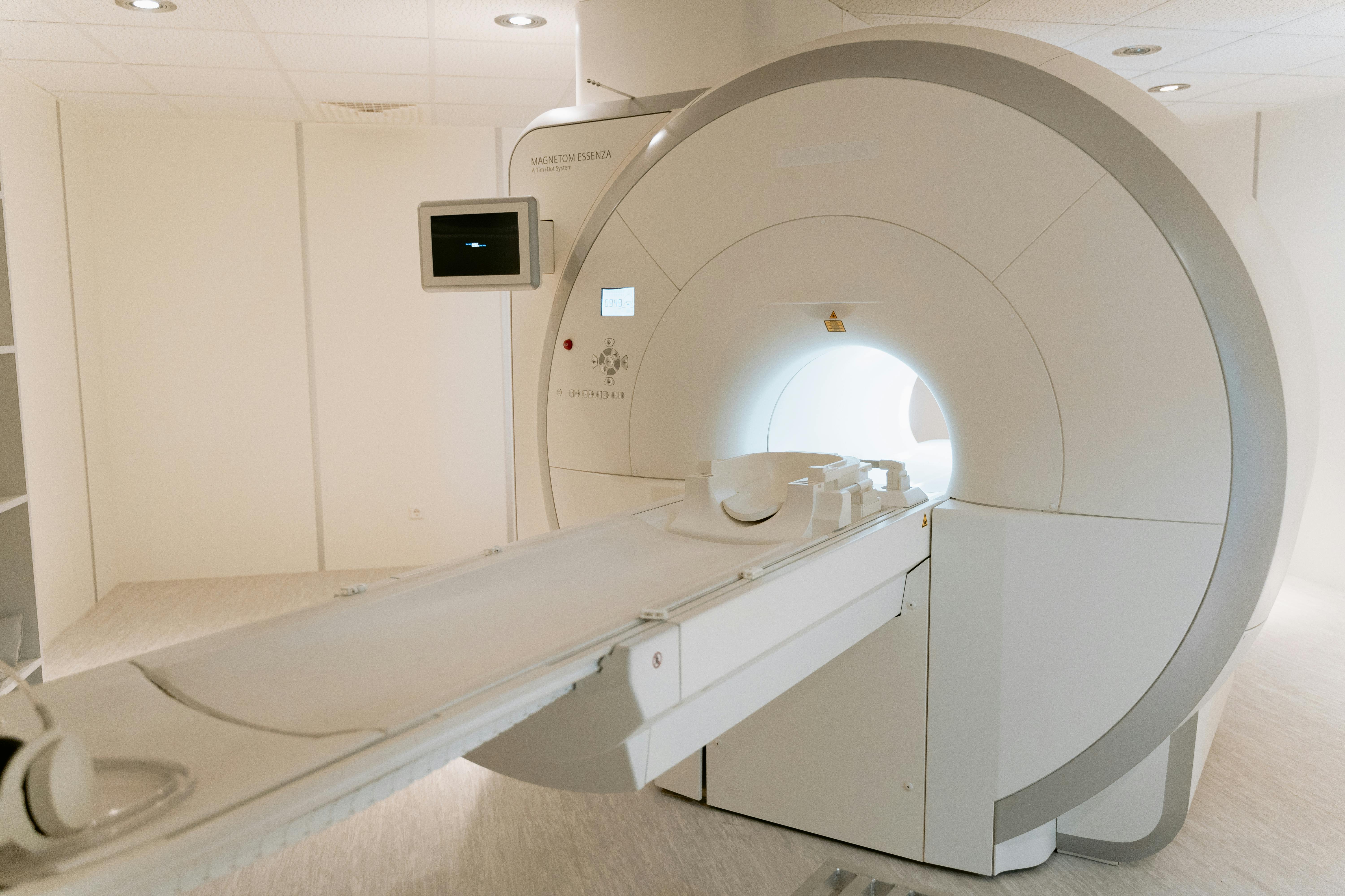 MRI machine and patient table. | Source: Pexels