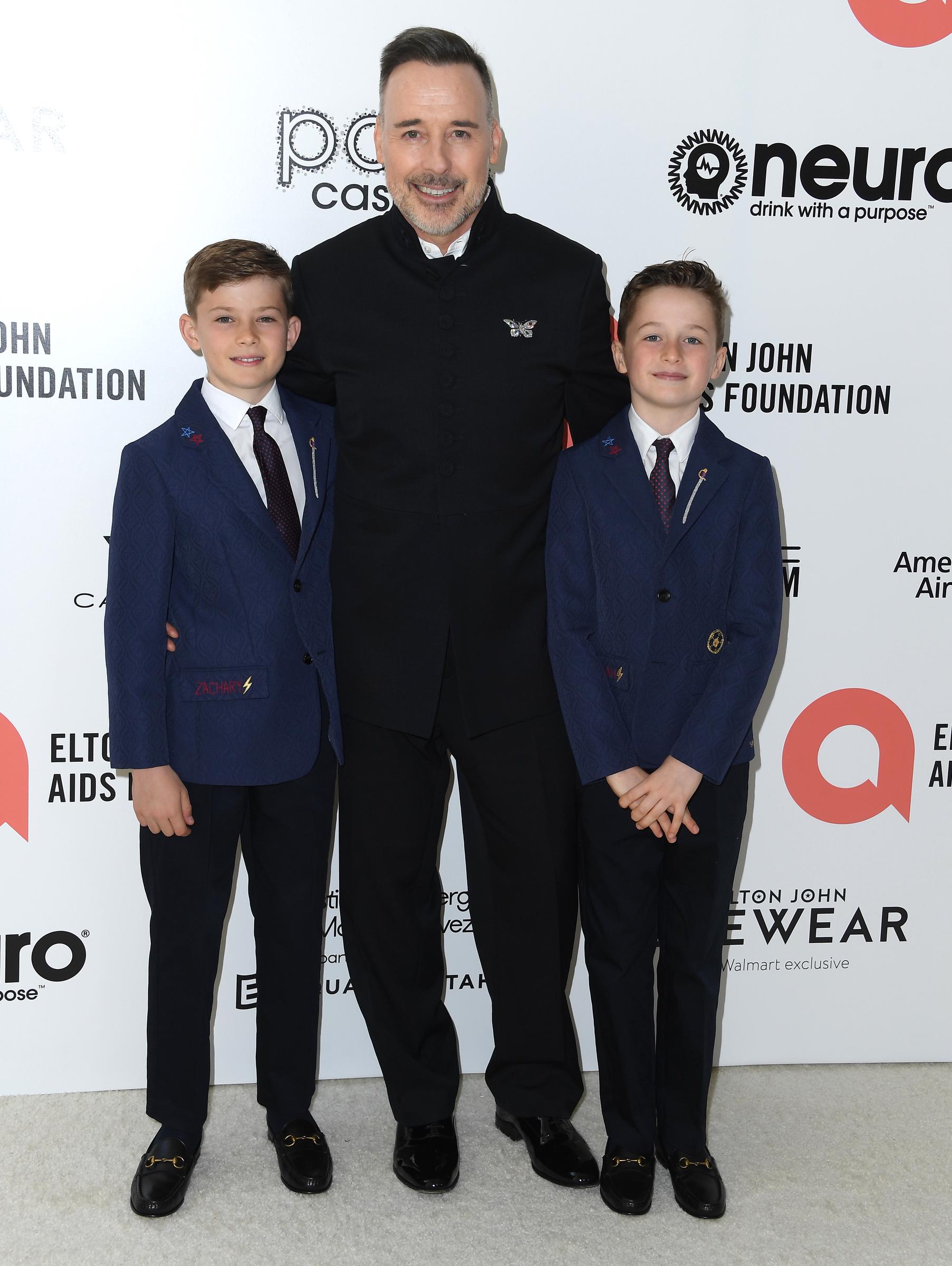 David Furnish with Zachary and Elijah Furnish-John at the Elton John AIDS Foundation's 30th Annual Academy Awards Viewing Party on March 27, 2022, in West Hollywood, California. | Source: Getty Images