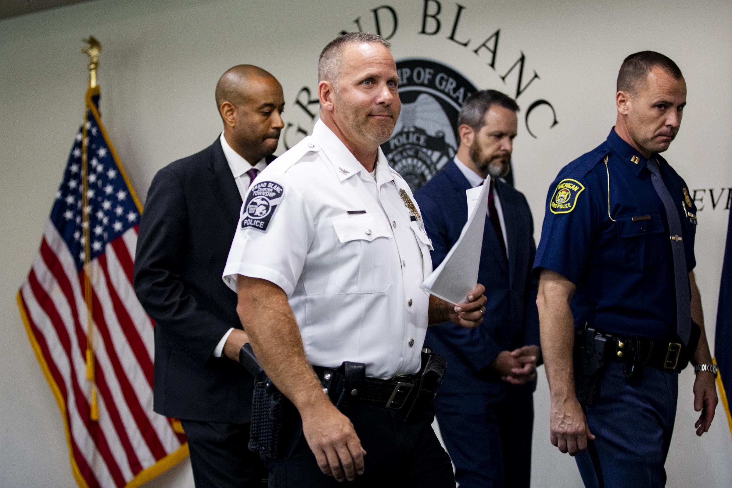 Chief of Police William Renye leaves a press conference at the Grand Blanc County Police Department after a shooting and fire at the Church of Jesus Christ of Latter-day Saints on September 28, 2025, in Grand Blanc, Michigan. | Source: Getty Images