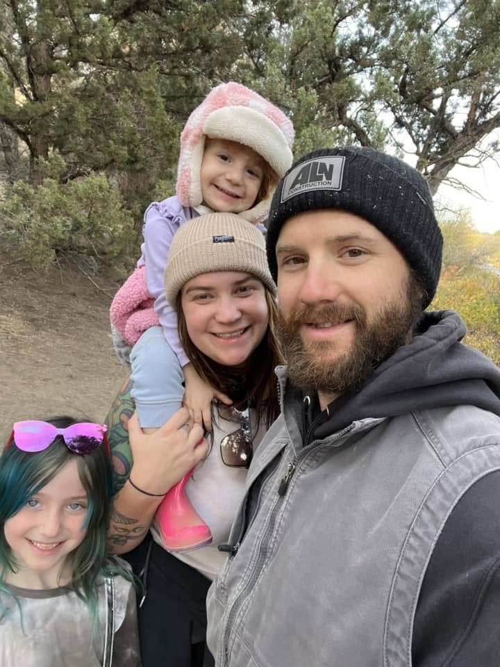 Kaylub Giamanco with his wife, Kelsey, and their two daughters during a family outing — both girls attended the elementary school where he later confronted the gunman. | Source: Facebook / Kaylub Giamanco.